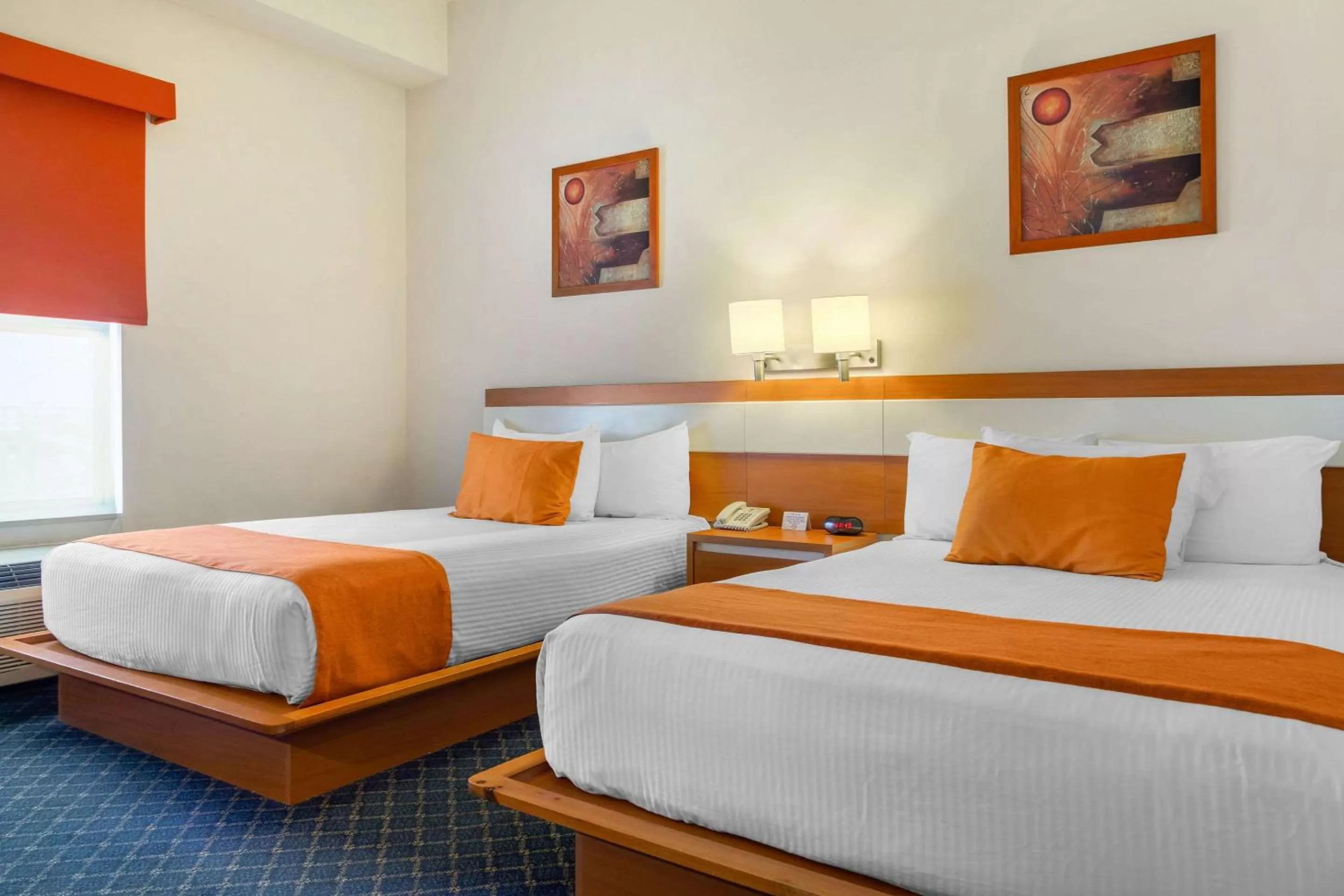 Photo of the whole room, Bed in Greenwood Hotel Torreón