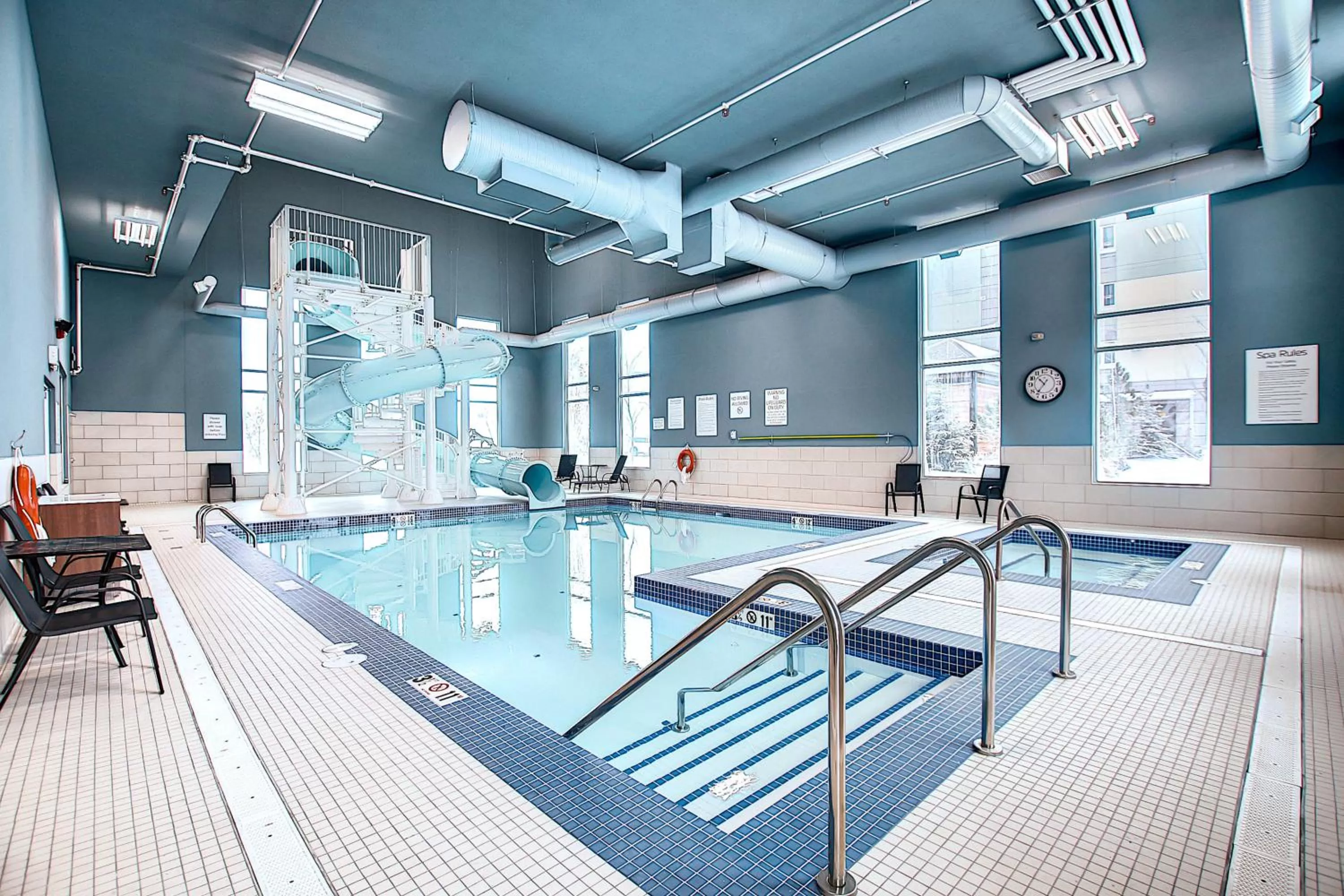 Swimming pool in Holiday Inn Express & Suites - Calgary Airport Trail NE by IHG