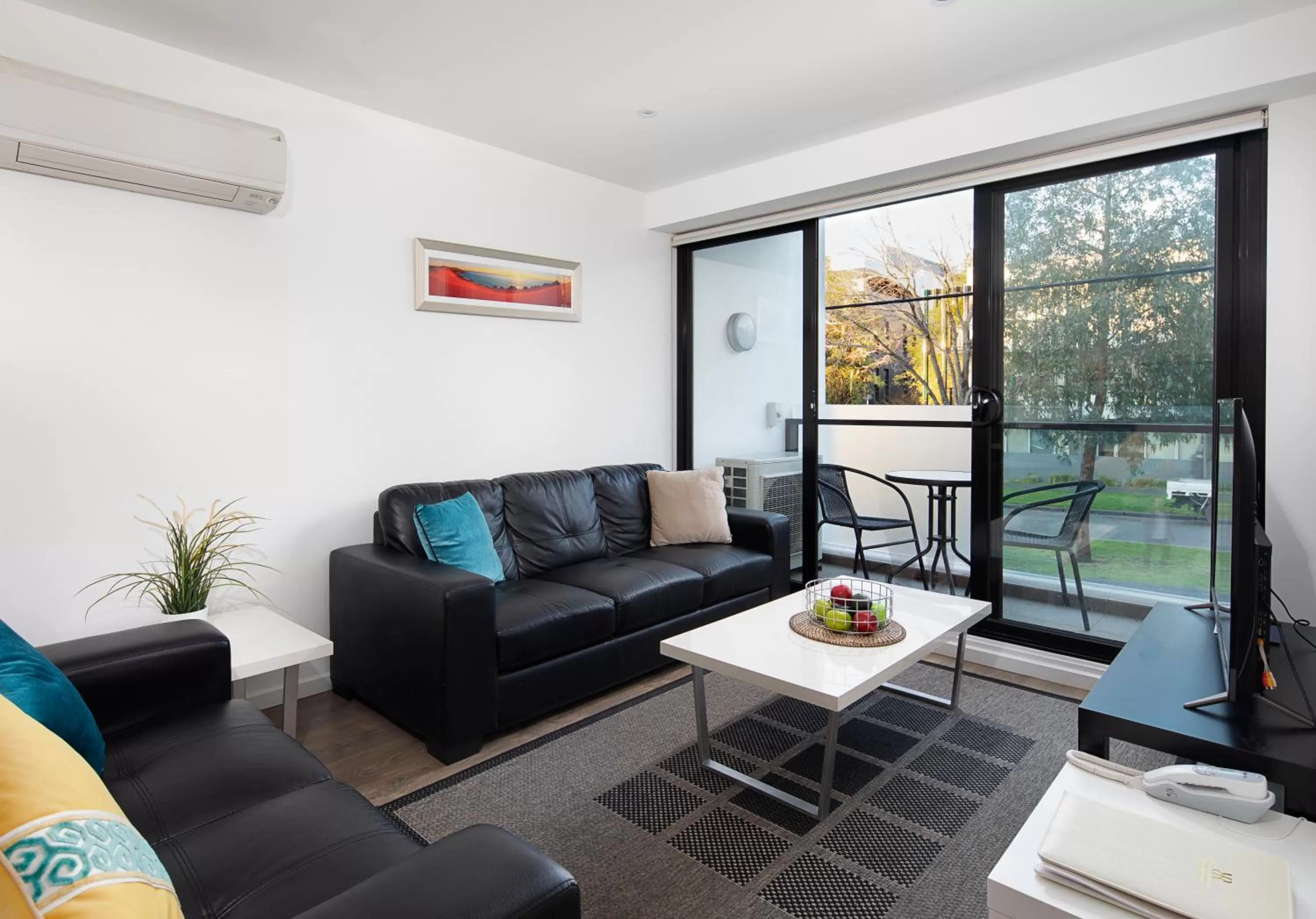 Living room in RNR Serviced Apartments North Melbourne