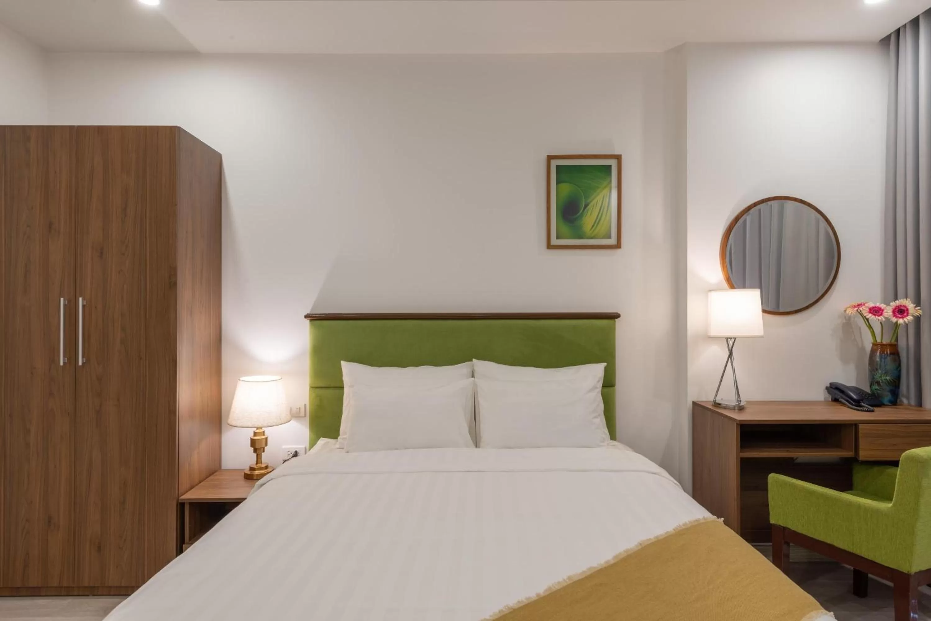 Bed in AMI Old Quarter Hotel