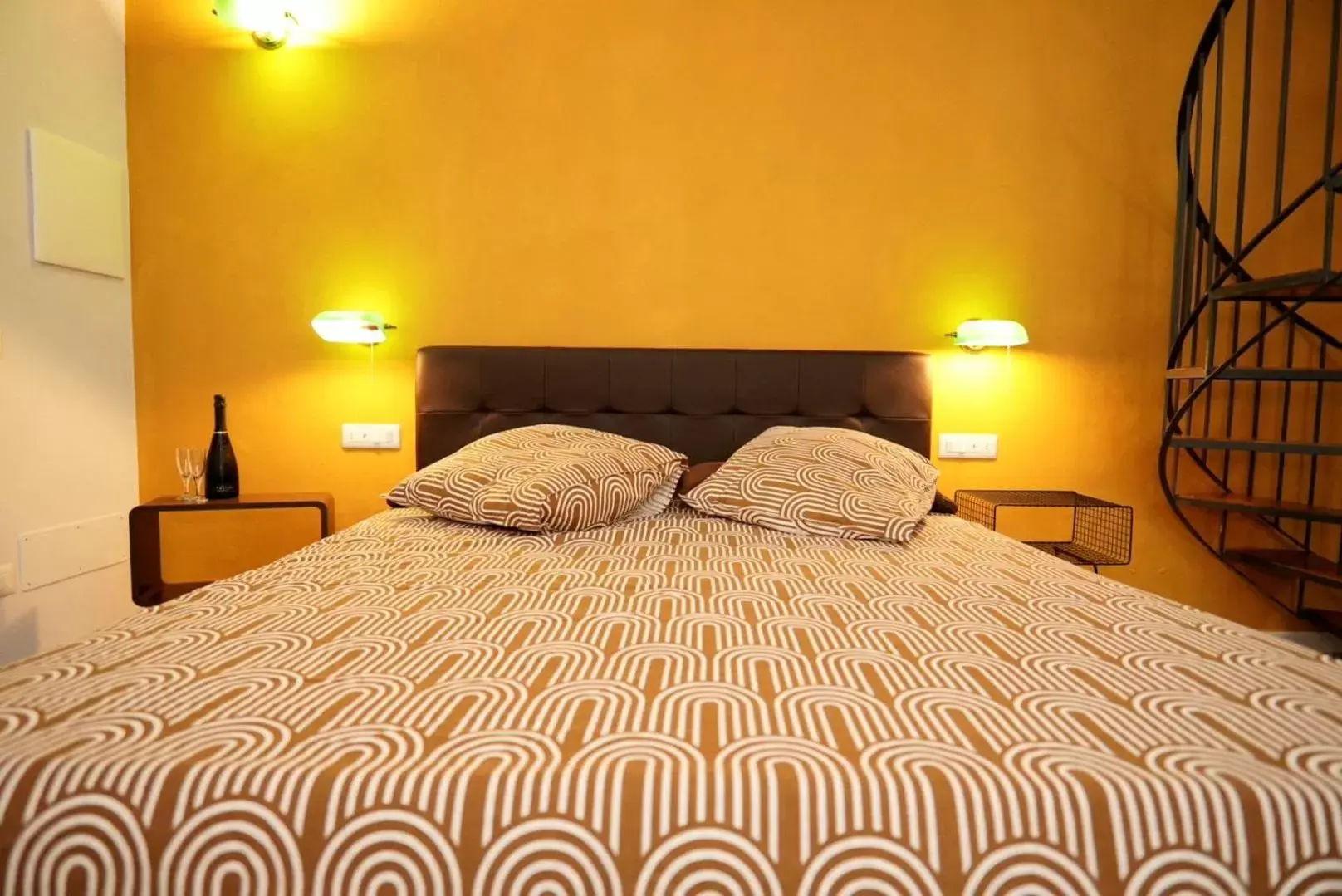 Bed in Cecenero Rooms