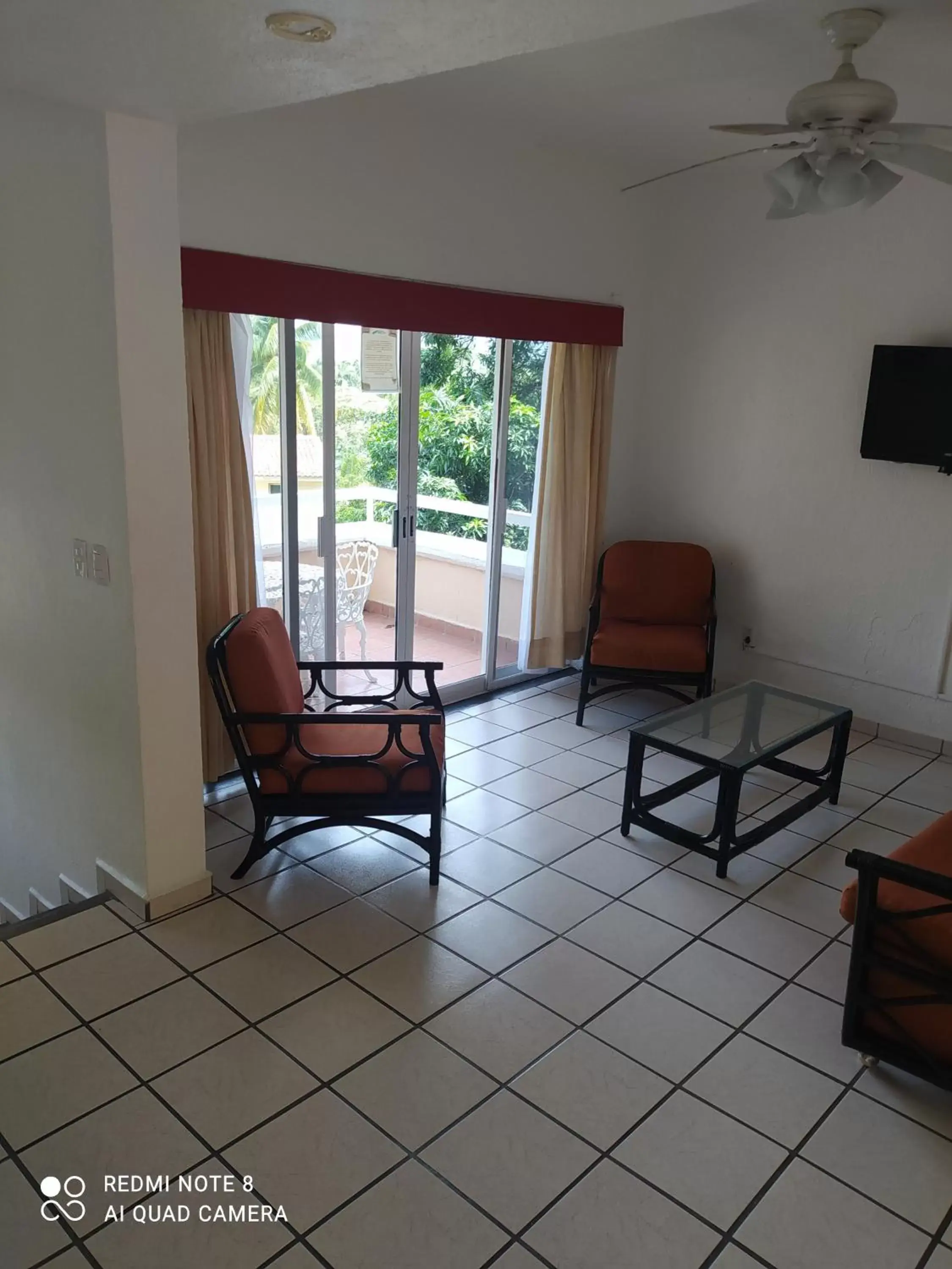 Photo of the whole room, Seating Area in Villas del Palmar Manzanillo with Beach Club