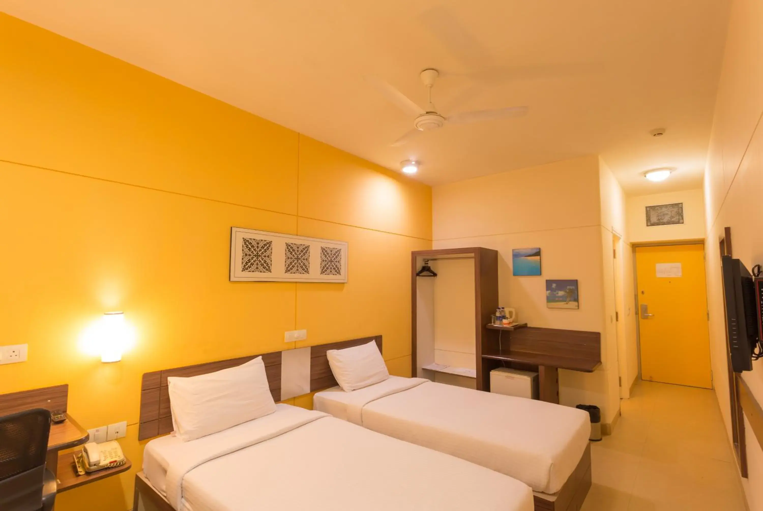 Photo of the whole room, Bed in Ginger Hotel Mangalore
