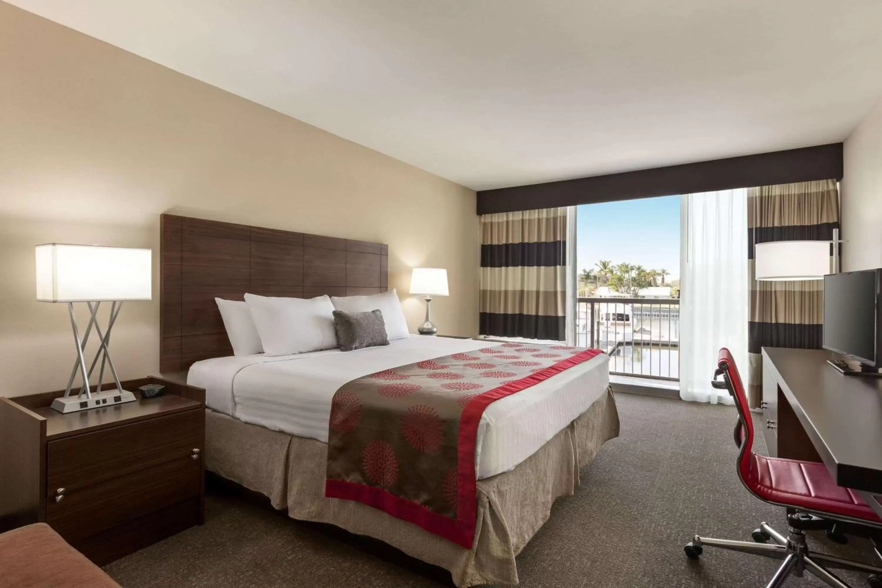 Photo of the whole room, Bed in Ramada by Wyndham Sarasota Waterfront