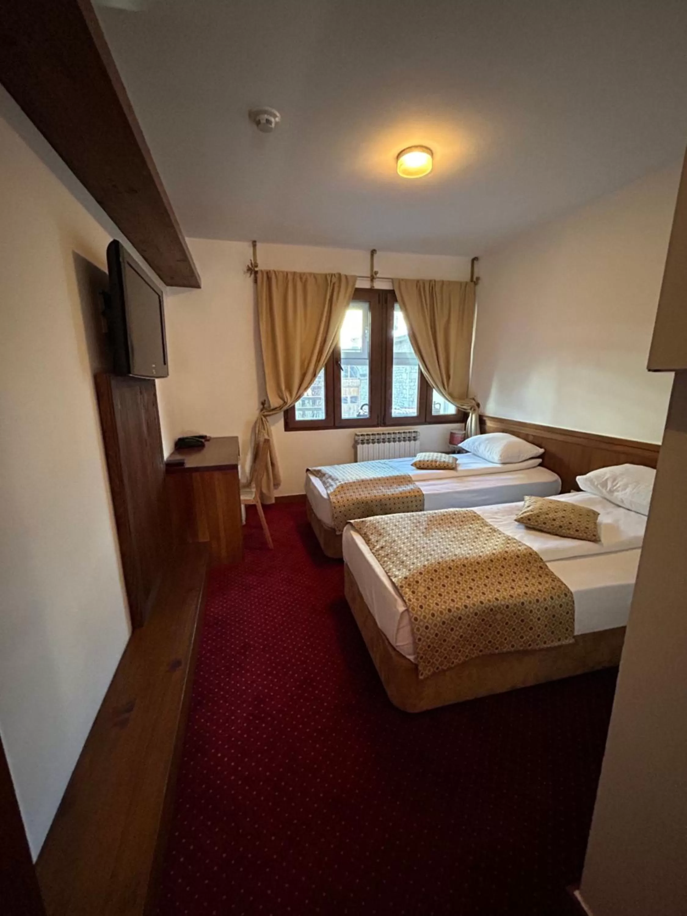 Bed in Garni Hotel Konak