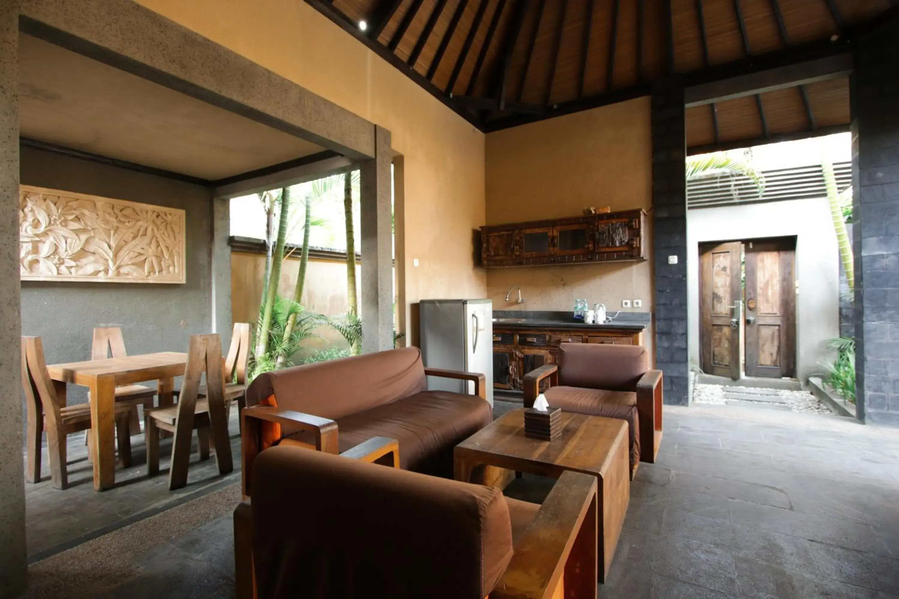 Seating Area in Gino Feruci Villa Ubud by KAGUM Hotels