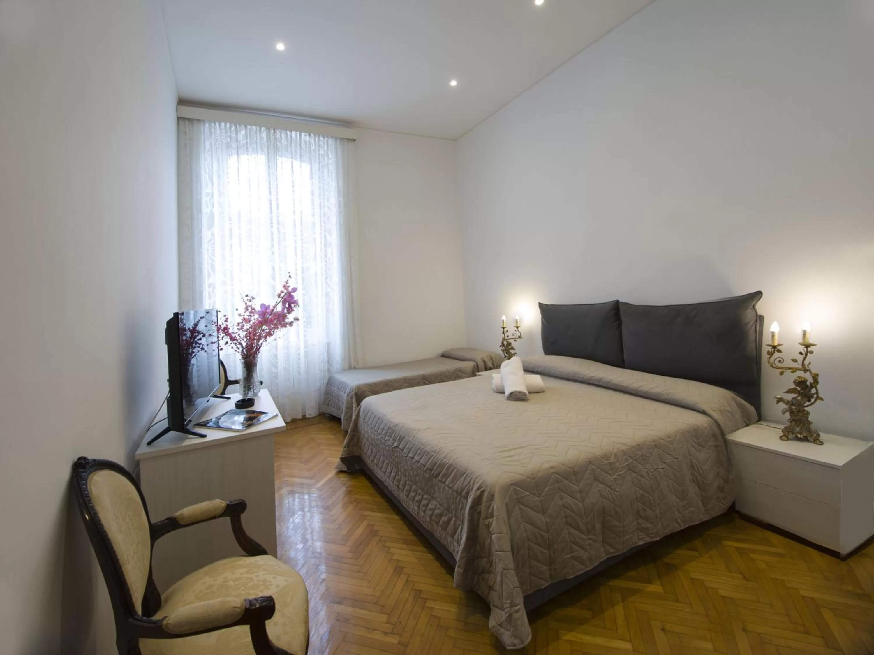 Bed in Hotel Alexander & Spa