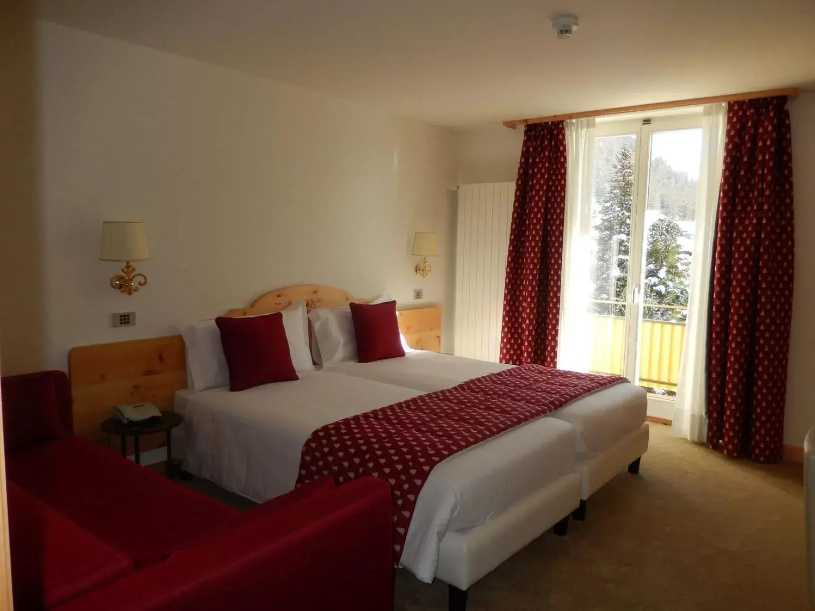 Bed in Hotel Schweizerhof Pontresina