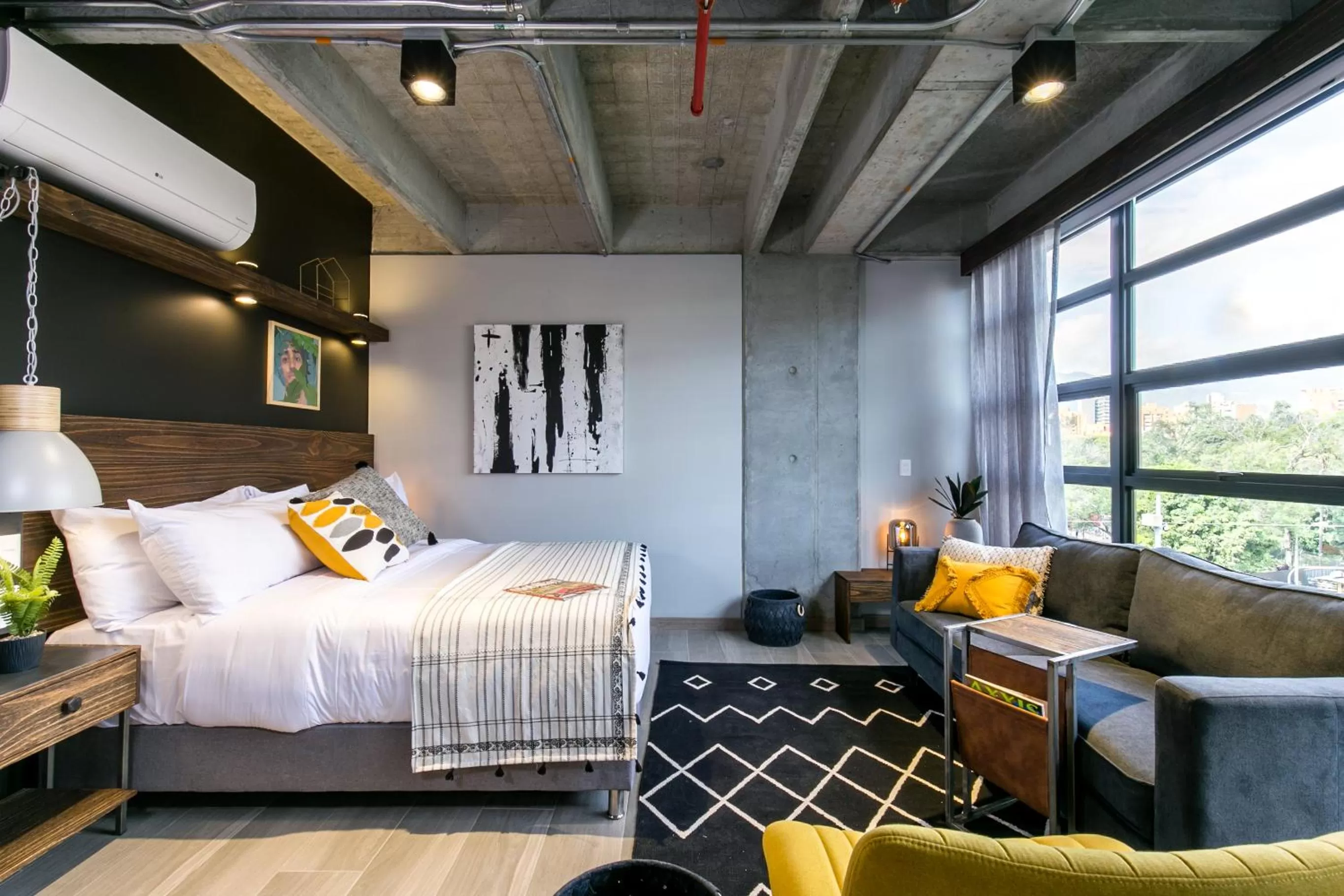 Bed in Factory Lofts Hotel