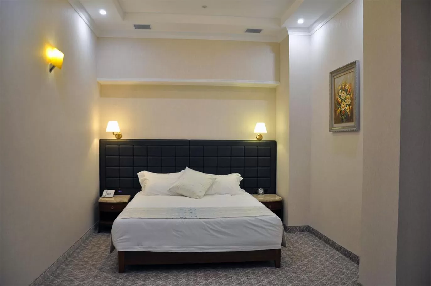 Bed in Parliament Palace Hotel