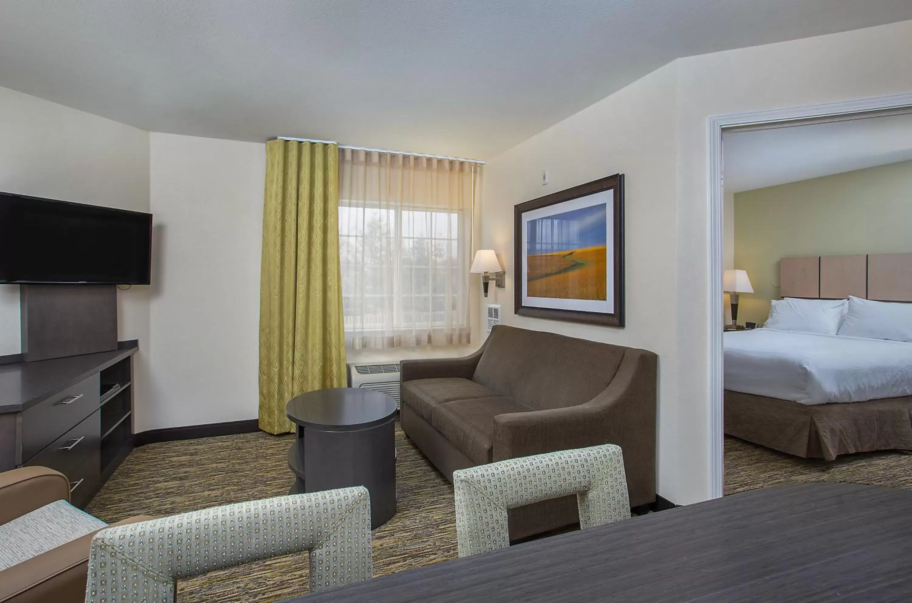 Photo of the whole room, TV/Entertainment Center in Candlewood Suites Bowling Green, an IHG Hotel