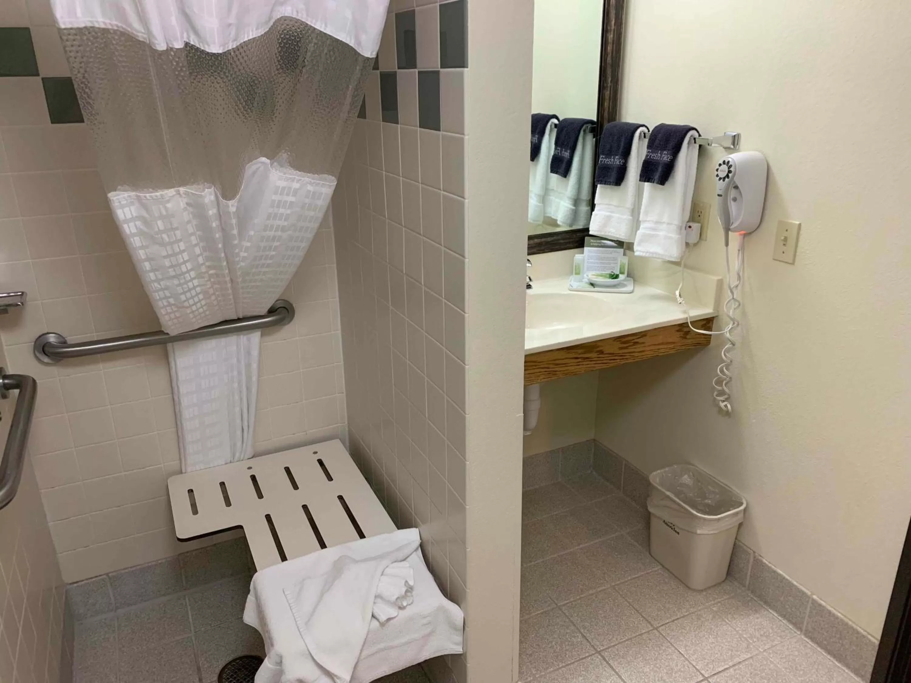 Bathroom in AmericInn by Wyndham Cody