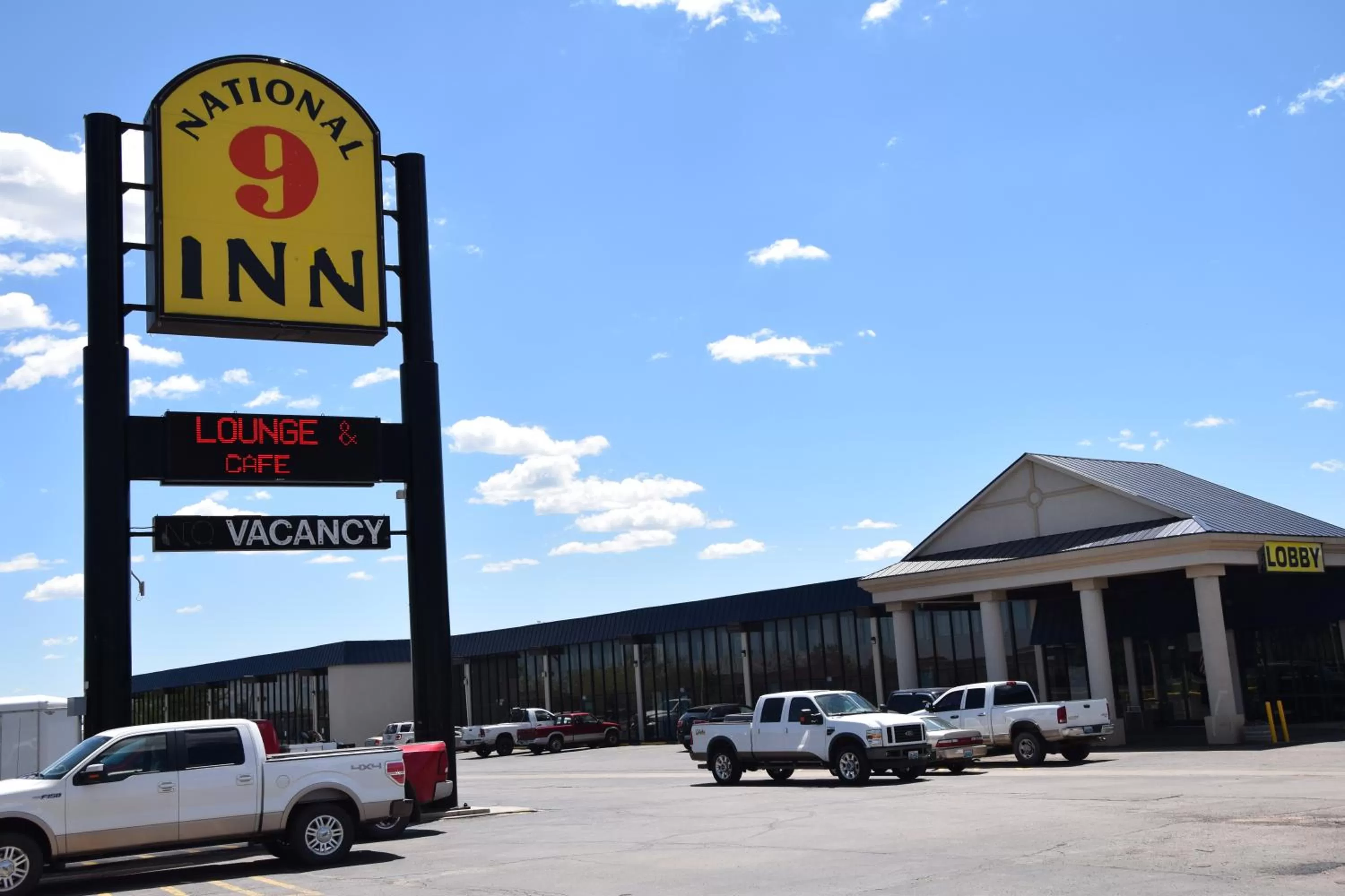 Property logo or sign in National 9 Inn Gillette