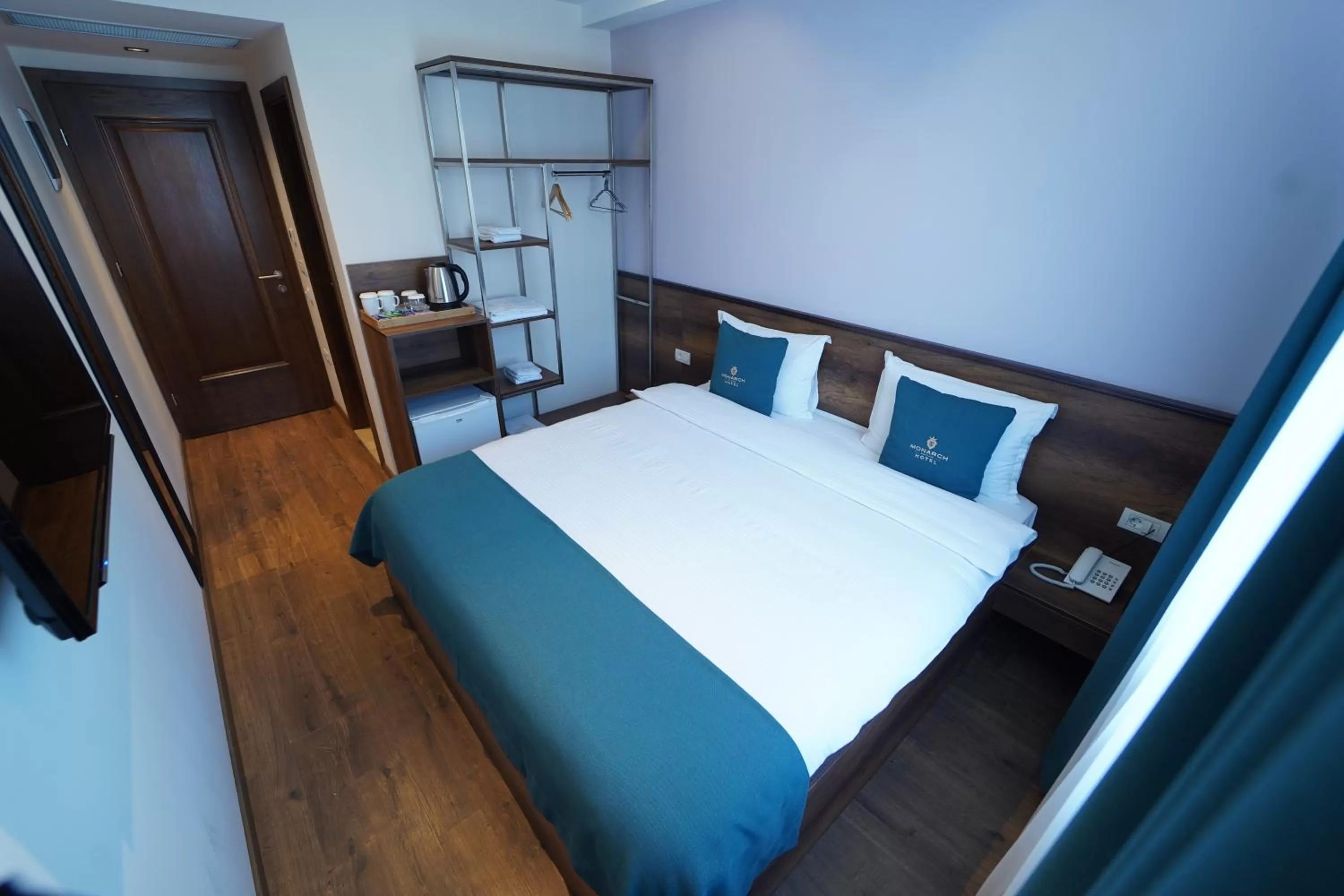 Photo of the whole room, Bed in Monarch Hotel