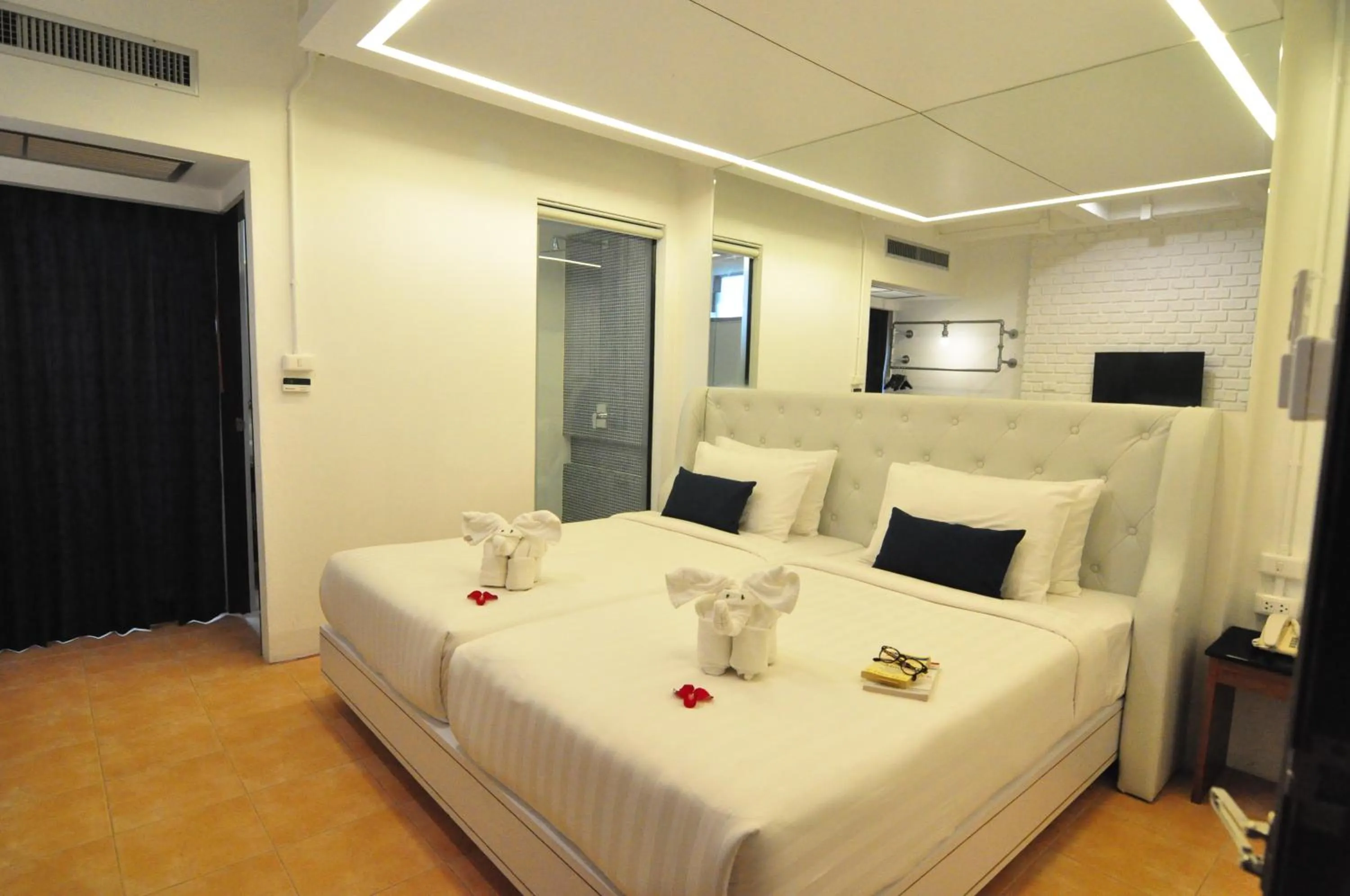 Bed in Forty Winks Phuket Hotel