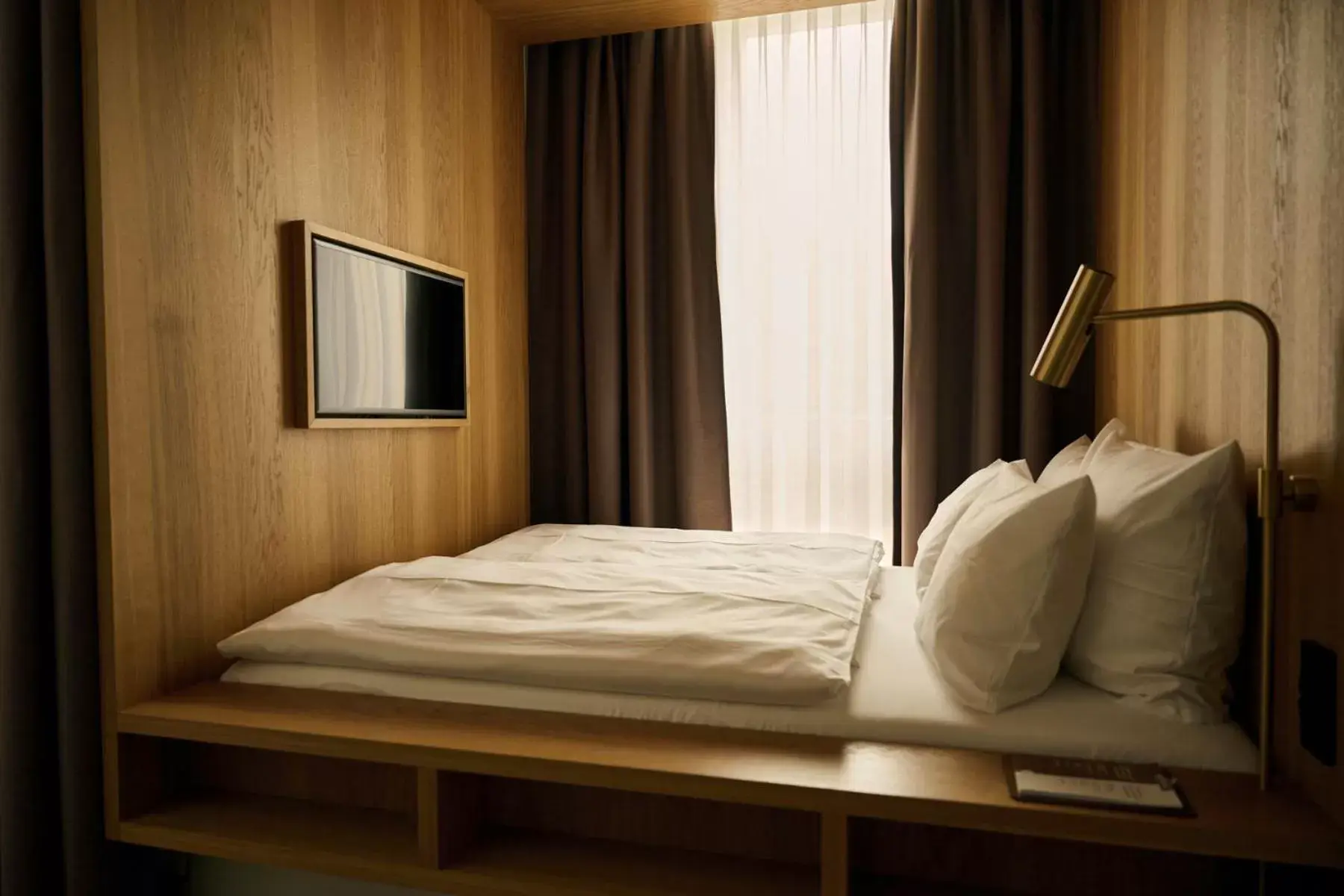 Bed in Melter Hotel & Apartments - a Neighborhood Hotel