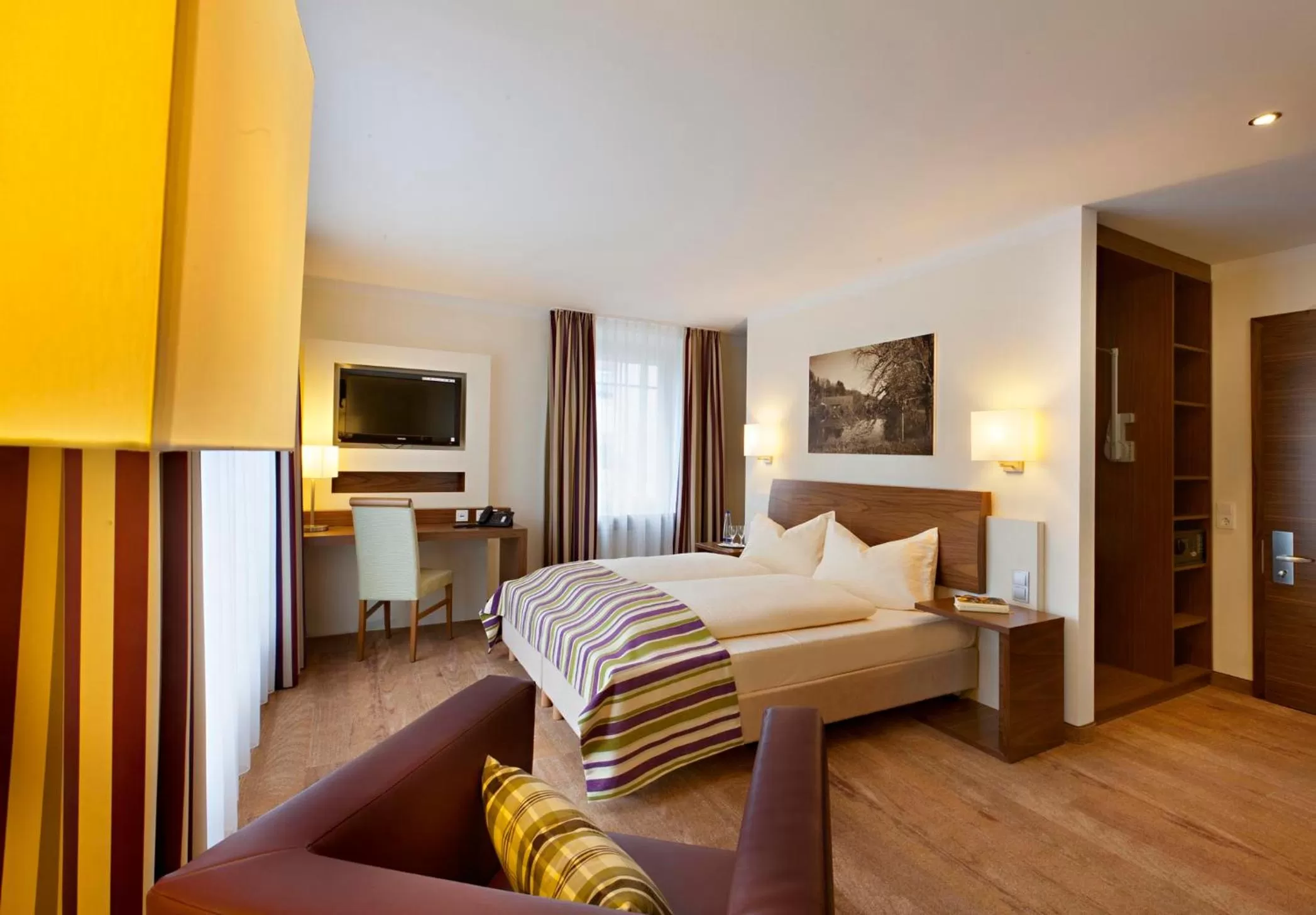 Seating area, Bed in Hotel Greinwald