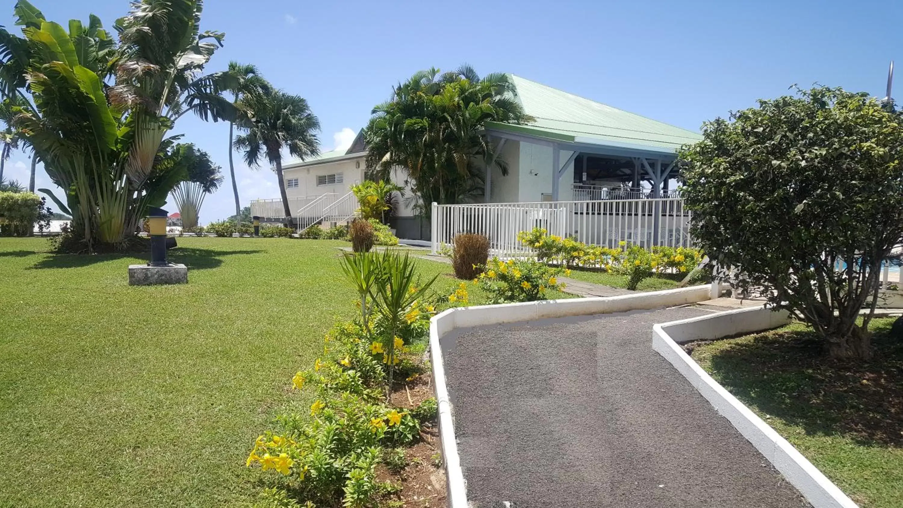 Garden view, Property Building in Hotel Village Soleil