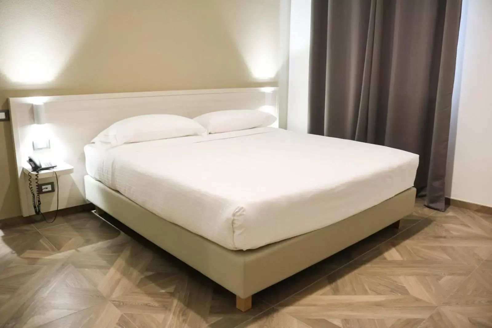 Bed in Hotel Donatello