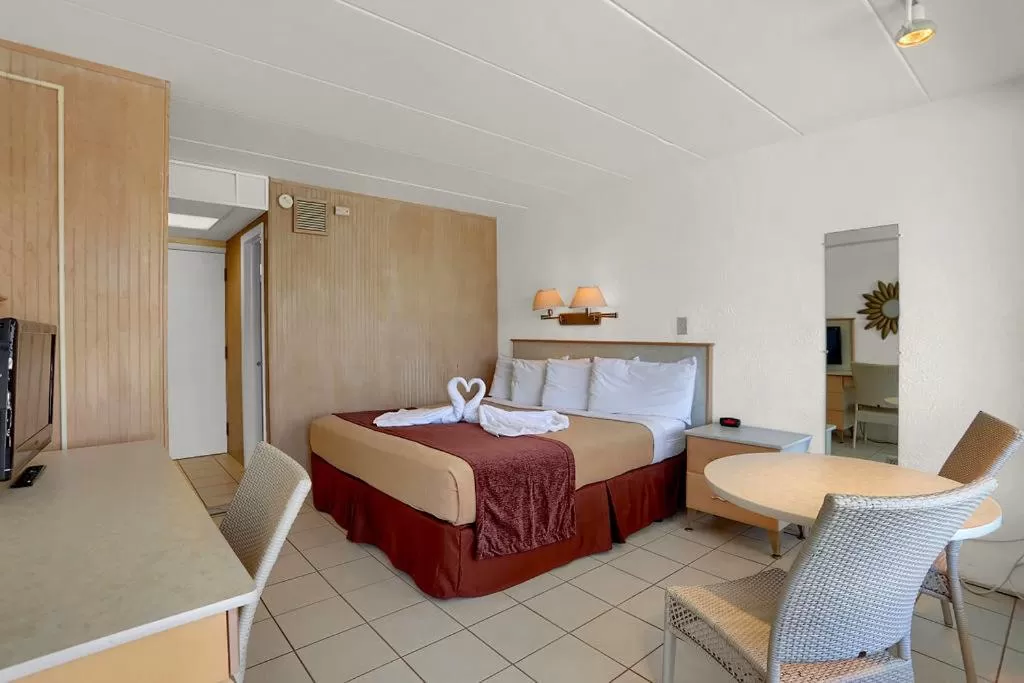 Bed in Heart of Wildwood Boardwalk Motel