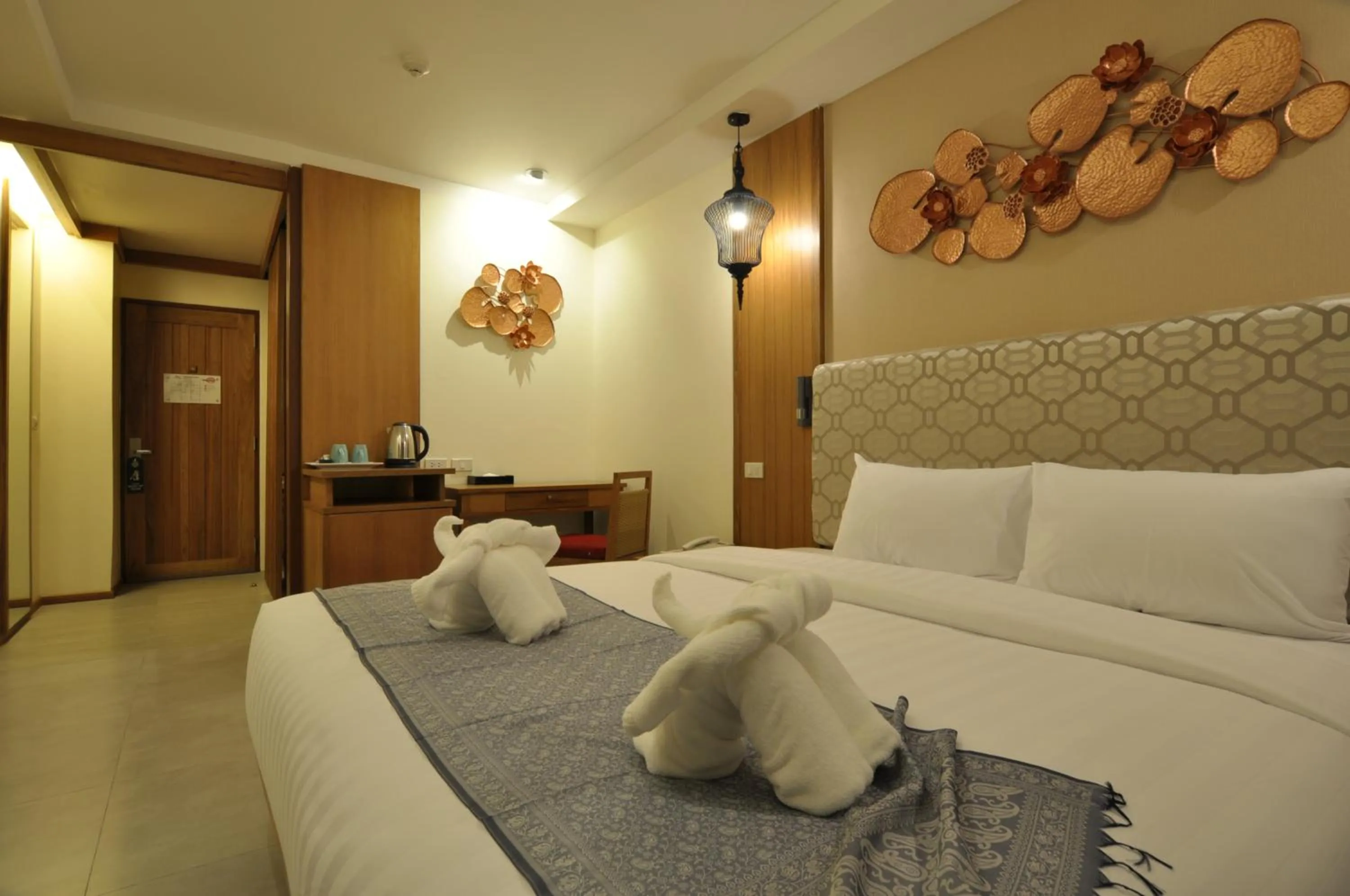 Bedroom in The Signature Hotel @ Thapae