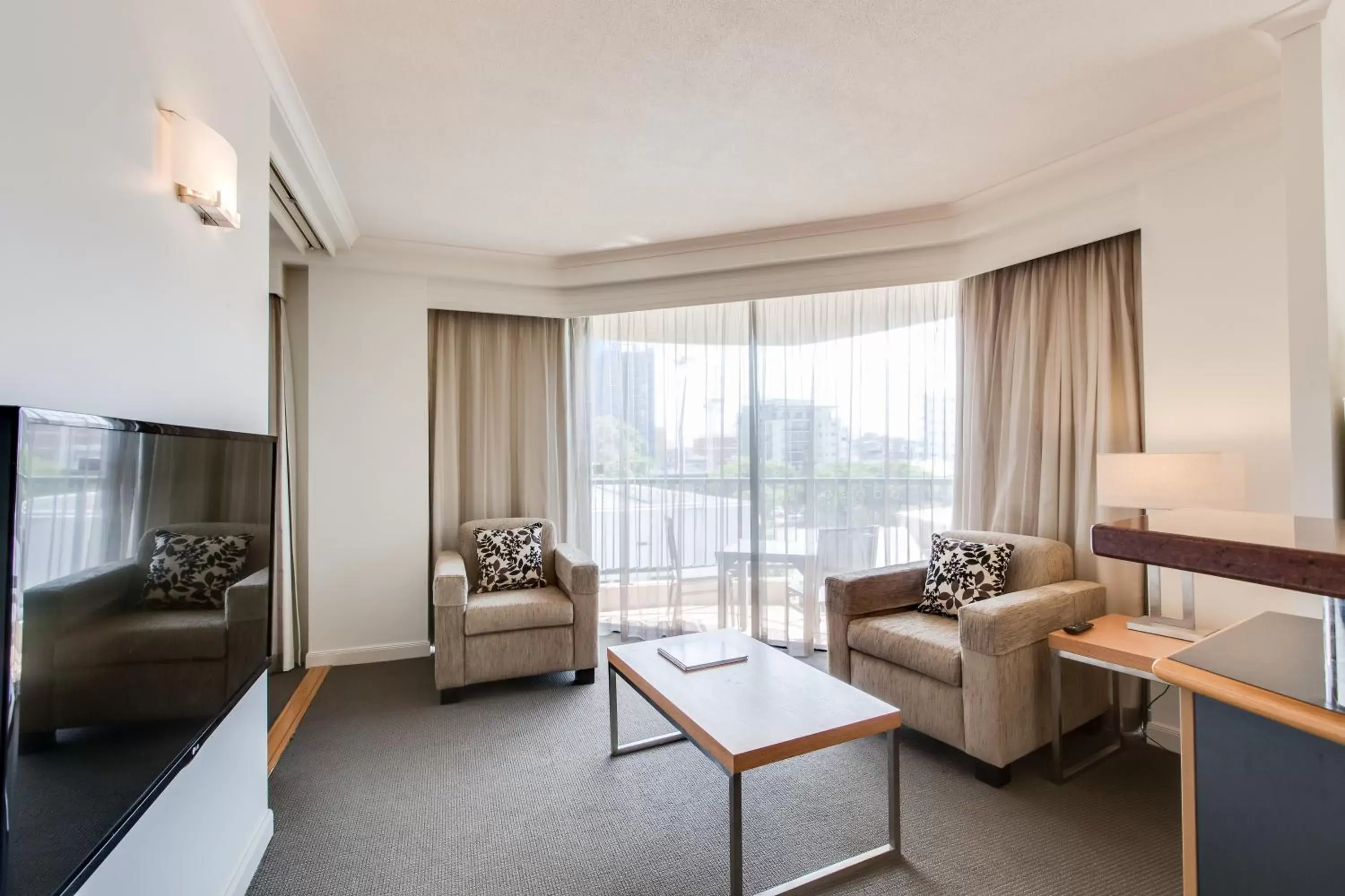 Living room, Seating Area in Central Cosmo Apartment Hotel