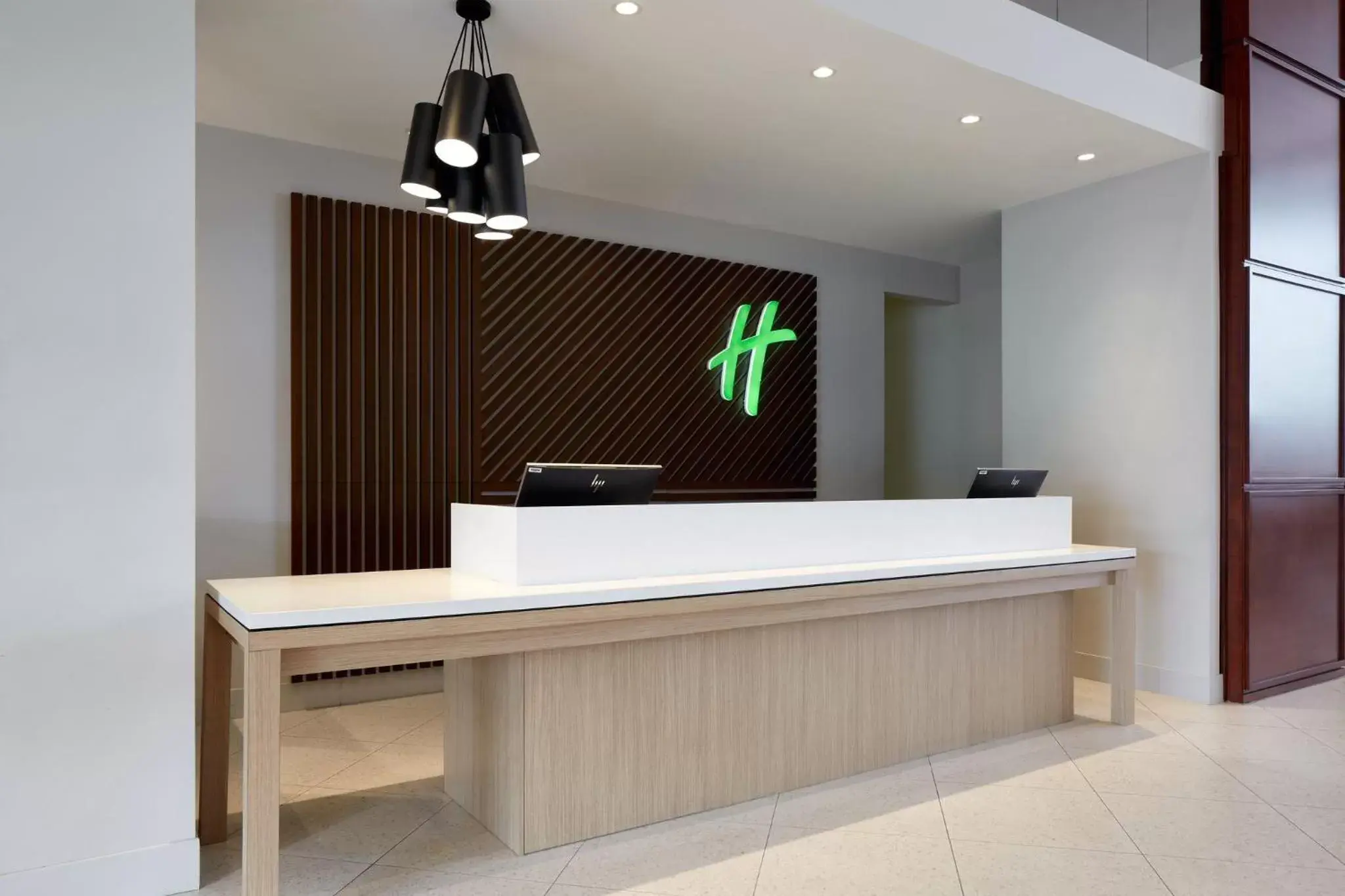 Property building, Lobby/Reception in Holiday Inn & Suites Montreal Airport