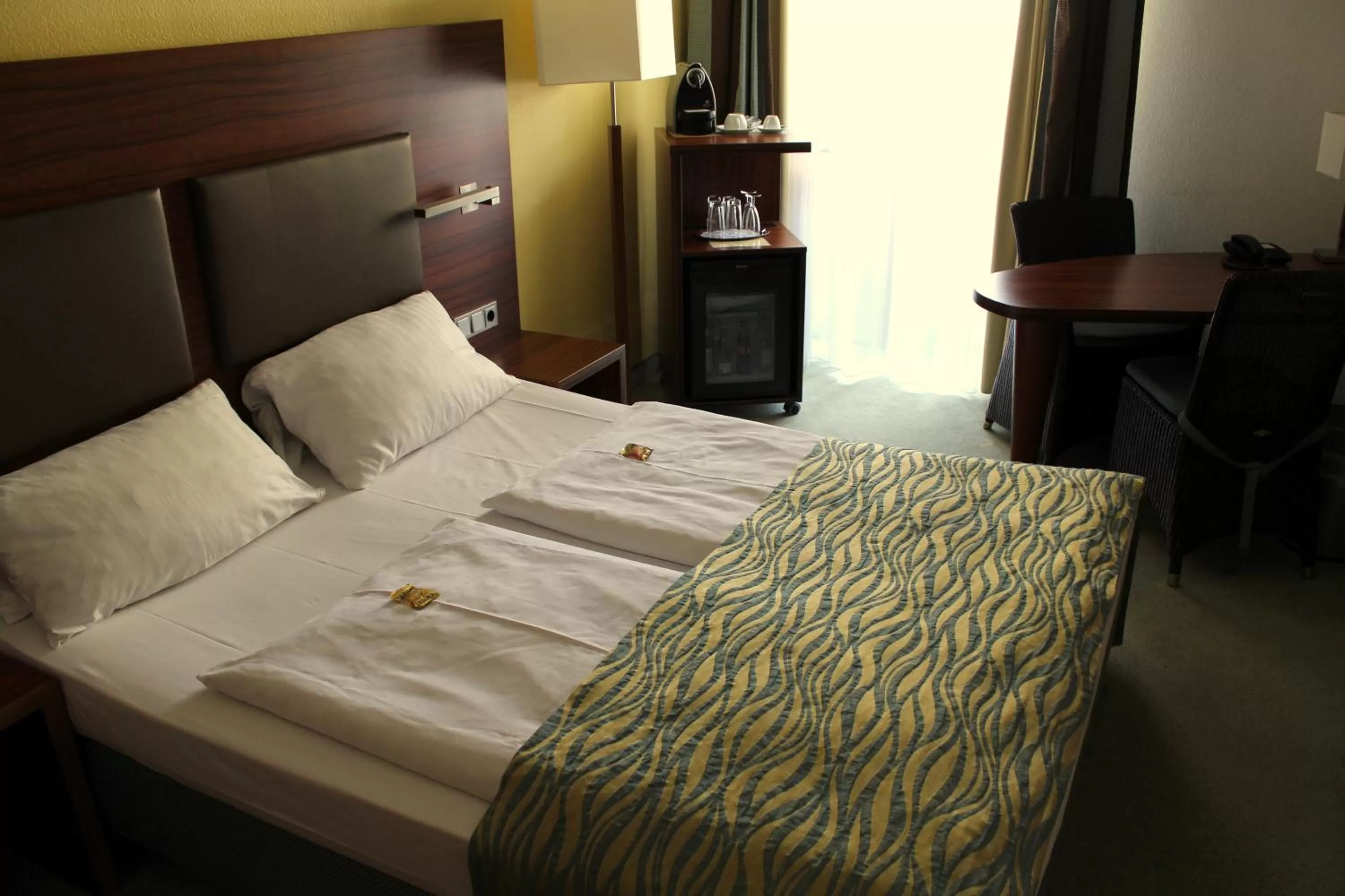 Bed in NP Hotel Wallis