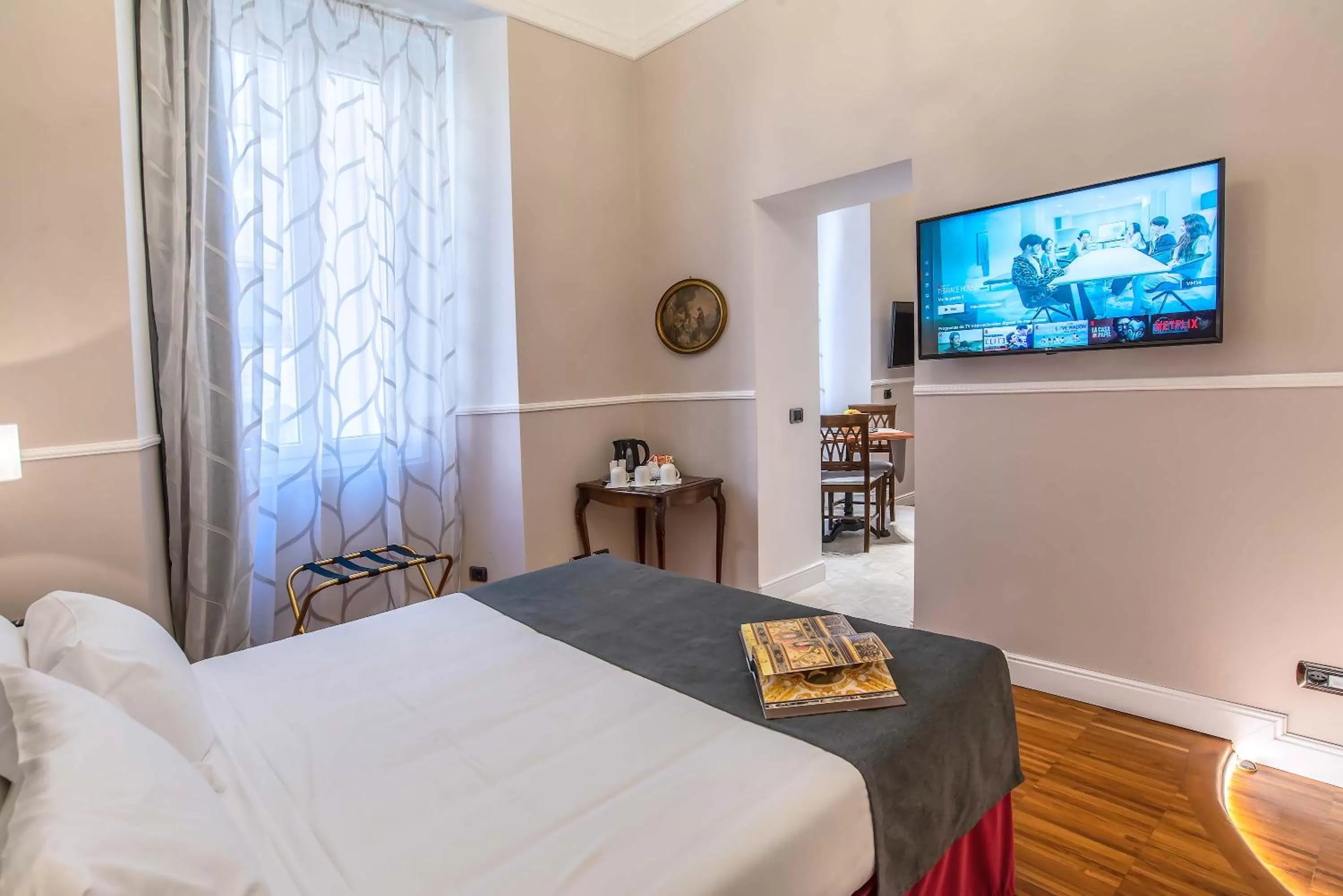 Bed in I TRE MOSCHETTIERI - D'ARTAGNAN Luxury Guest House