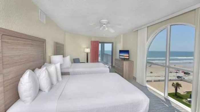 Bed in El Caribe Resort and Conference Center