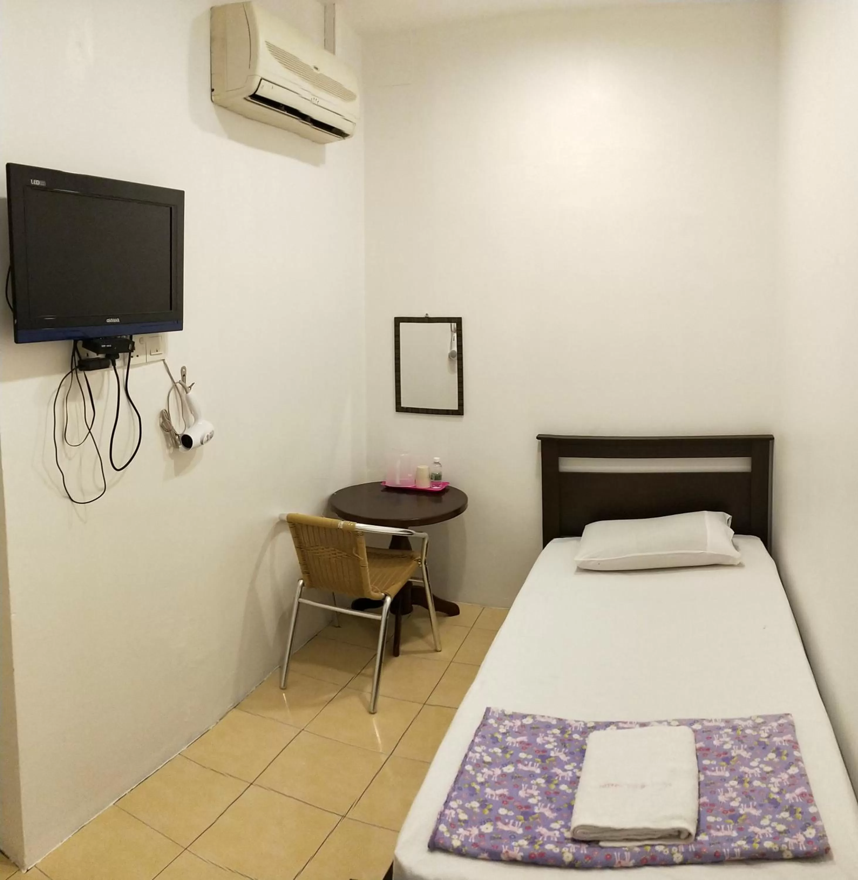 Bed in Hotel Tanjong