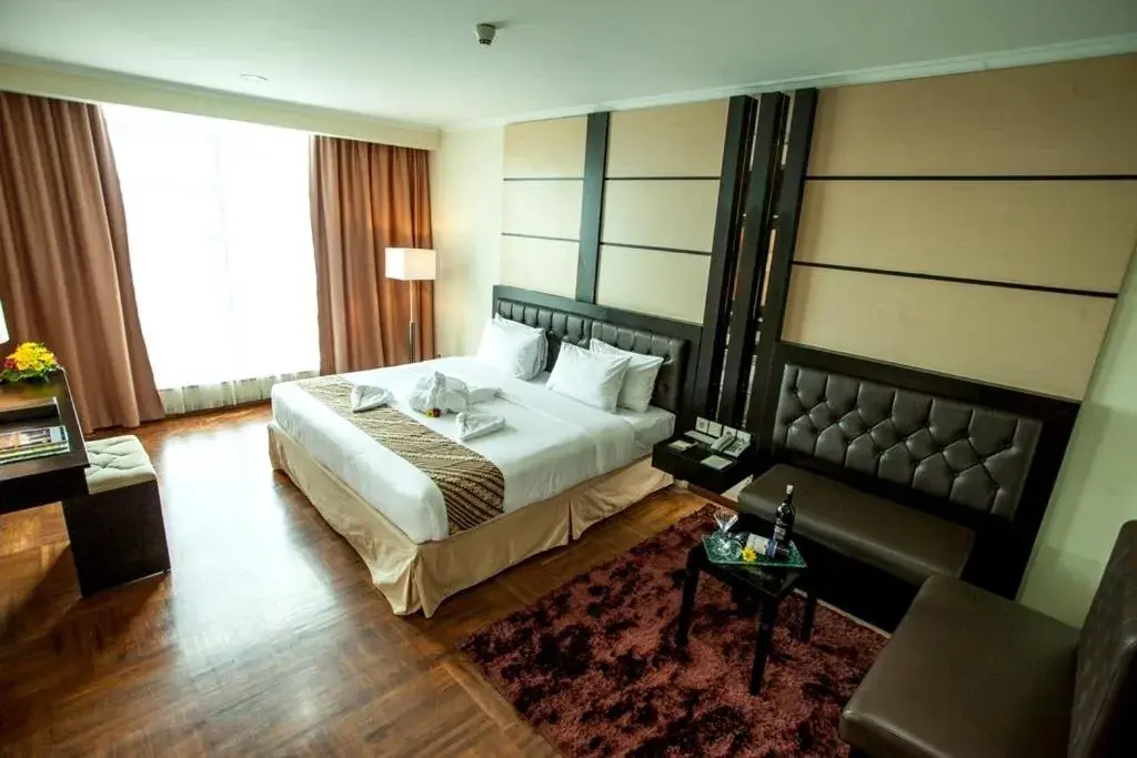 Bedroom in Ros-In Hotel