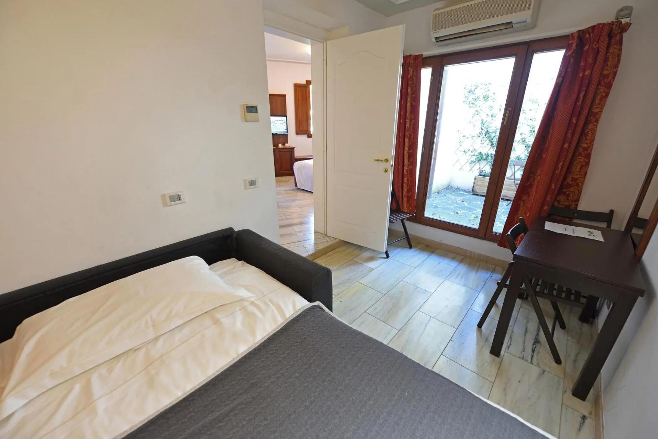 Bed in Relais La Corte di Cloris