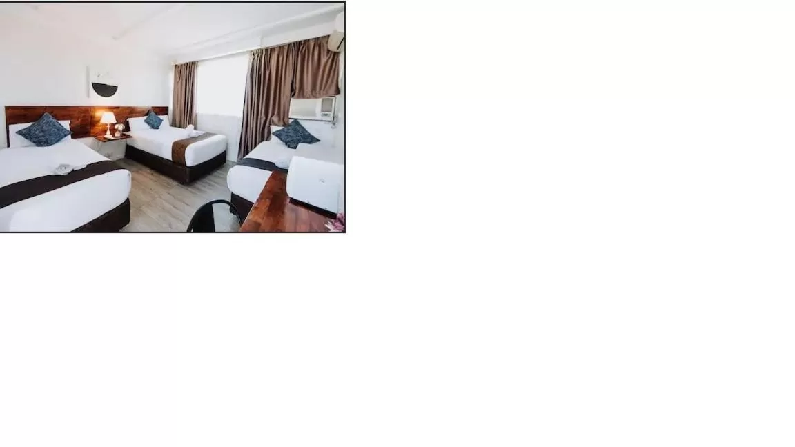 Bed in Tamworth City Motel