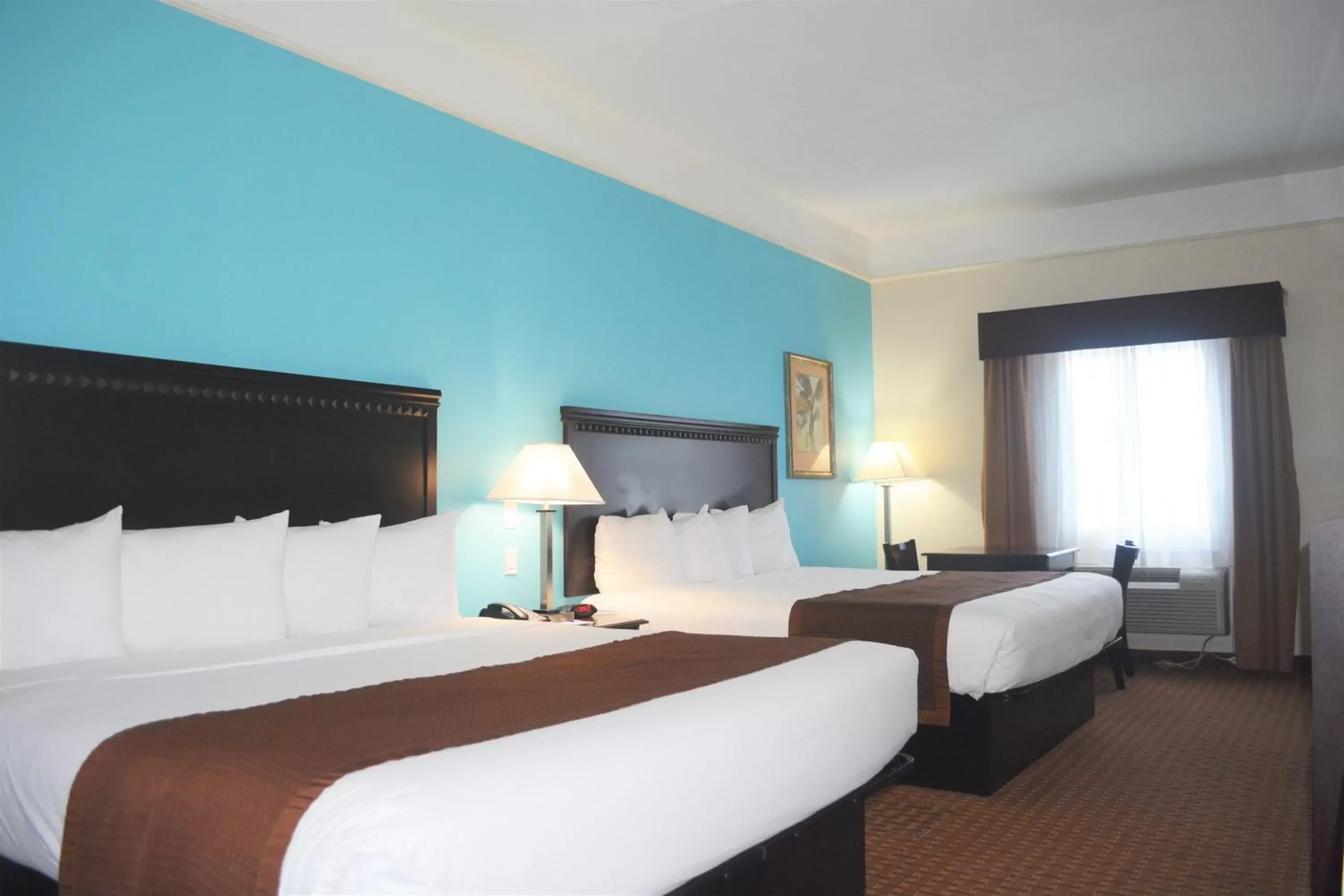 Photo of the whole room, Bed in Baymont by Wyndham Galveston