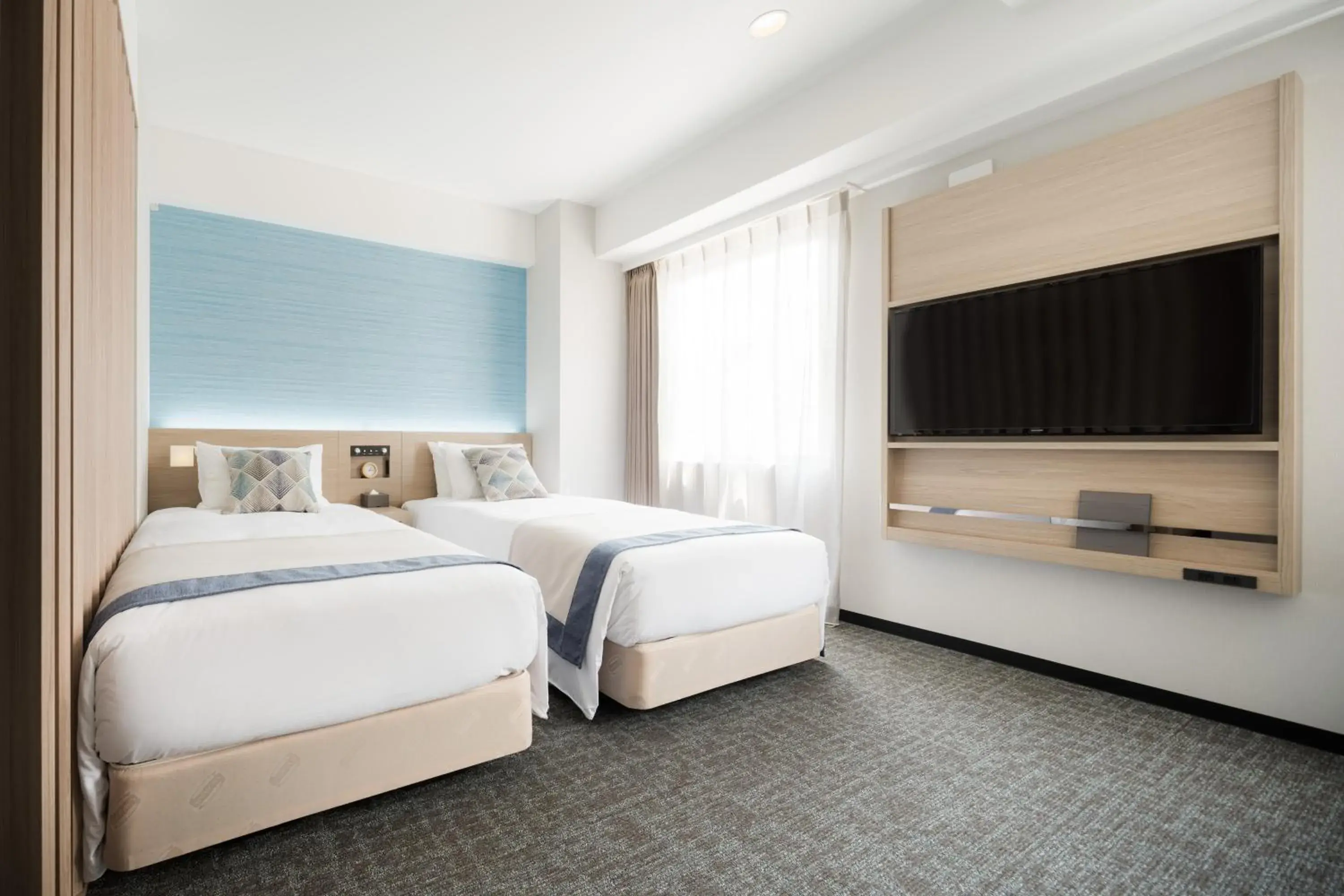 Bedroom, Bed in Tissage Hotel Naha by Nest