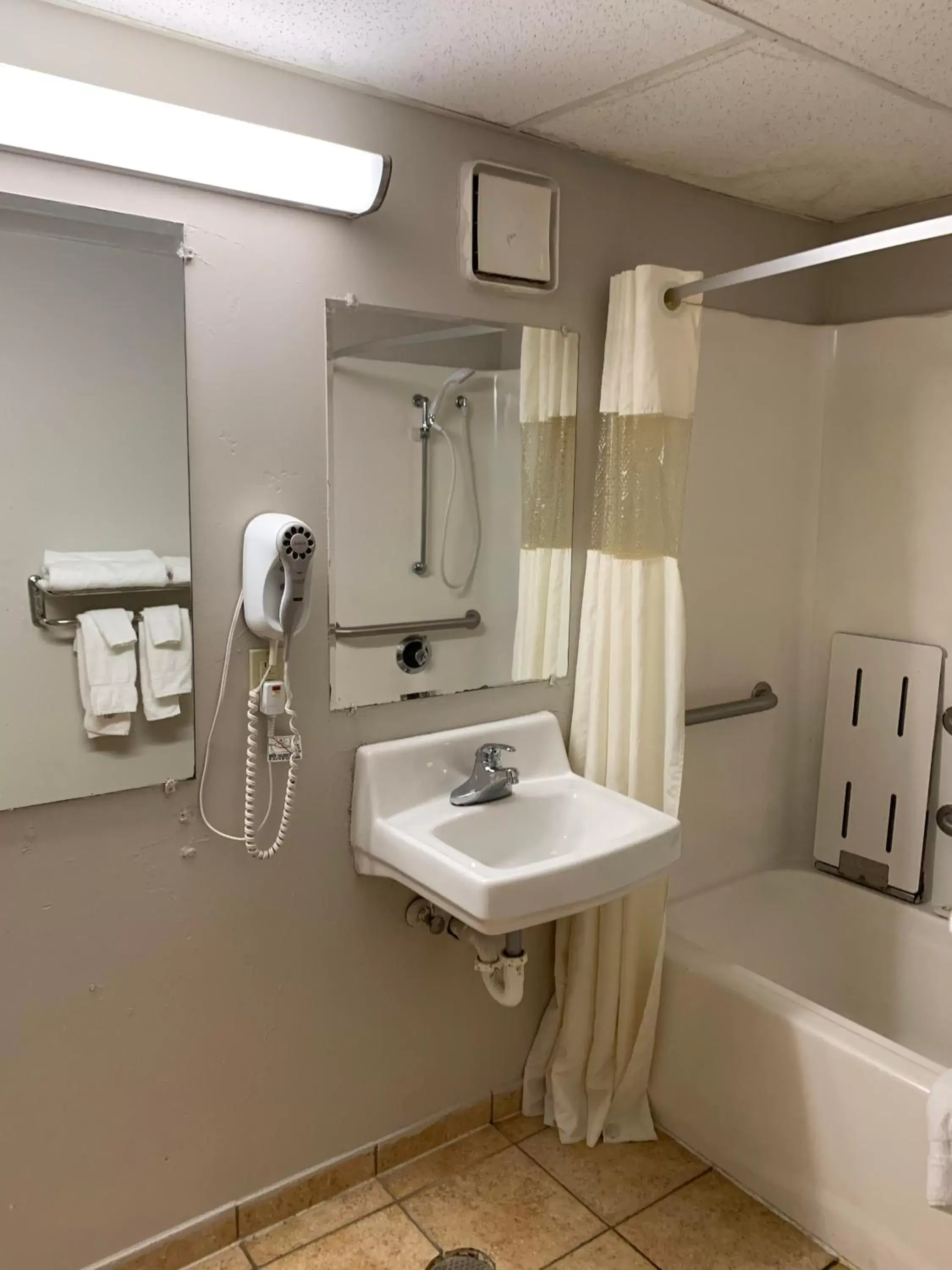 Shower, Bathroom in Days Inn by Wyndham Louisville Airport Fair and Expo Center