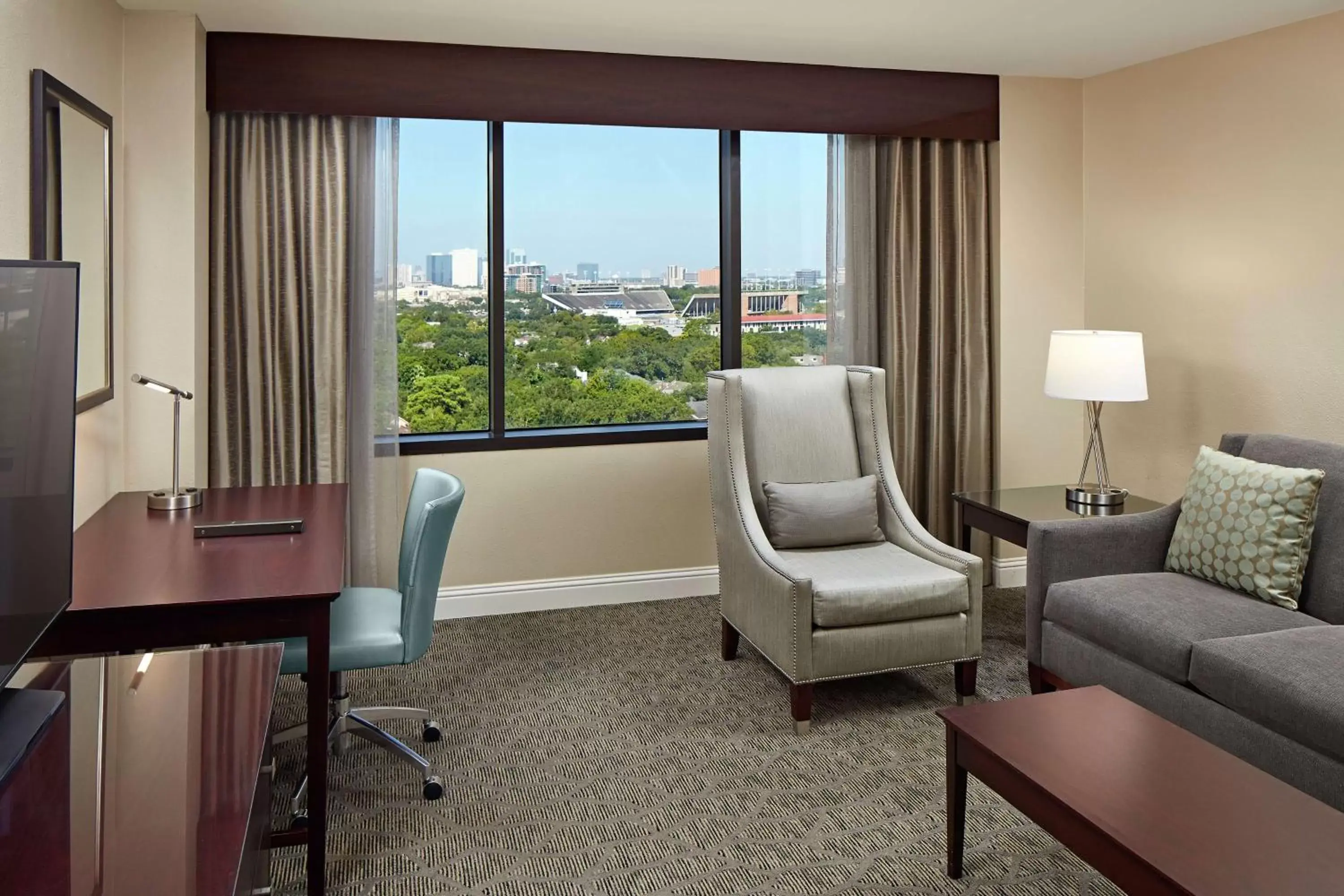 Bedroom, Seating Area in Hilton Houston Plaza/Medical Center