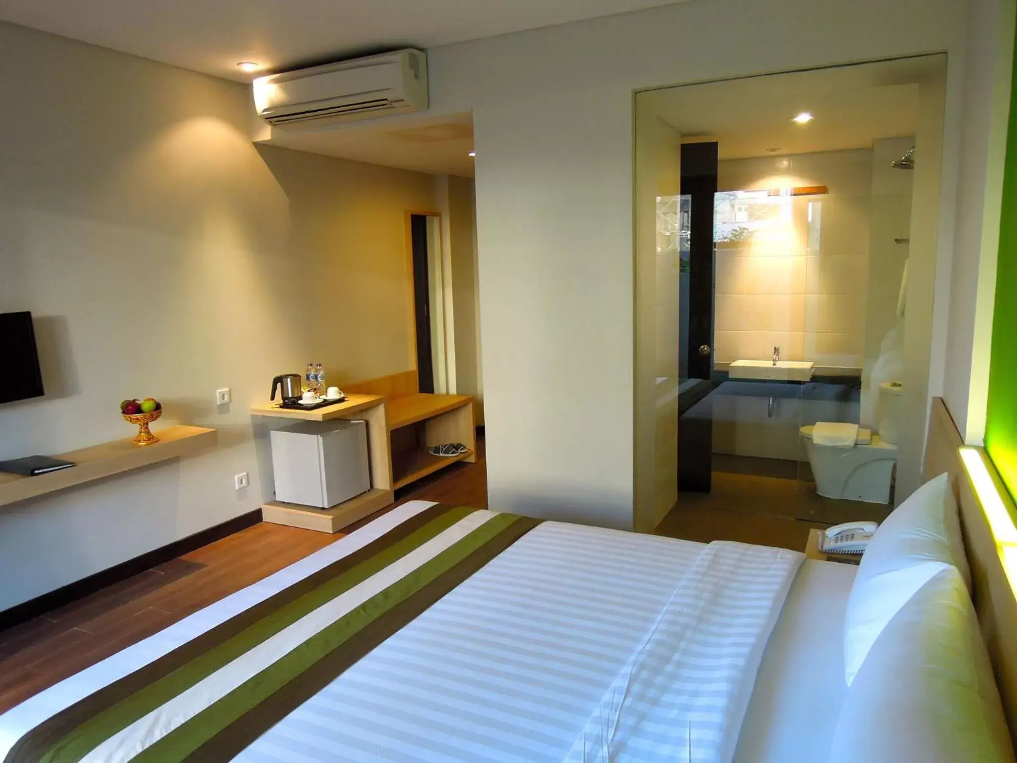 Bed in Grand Whiz Hotel Nusa Dua Bali