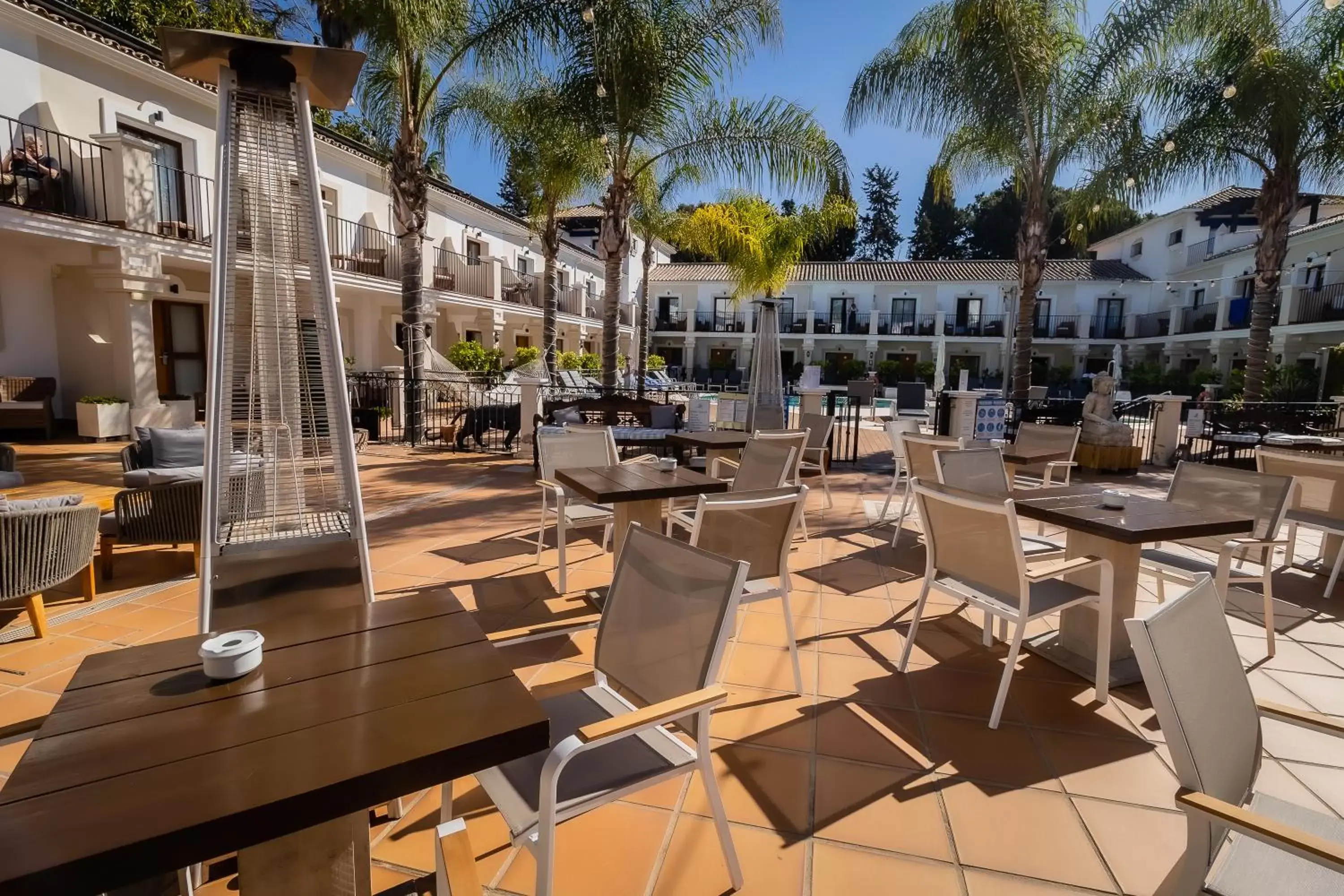 Patio, Restaurant/Places to Eat in Paloma Blanca Boutique Hotel- Adults Recommended