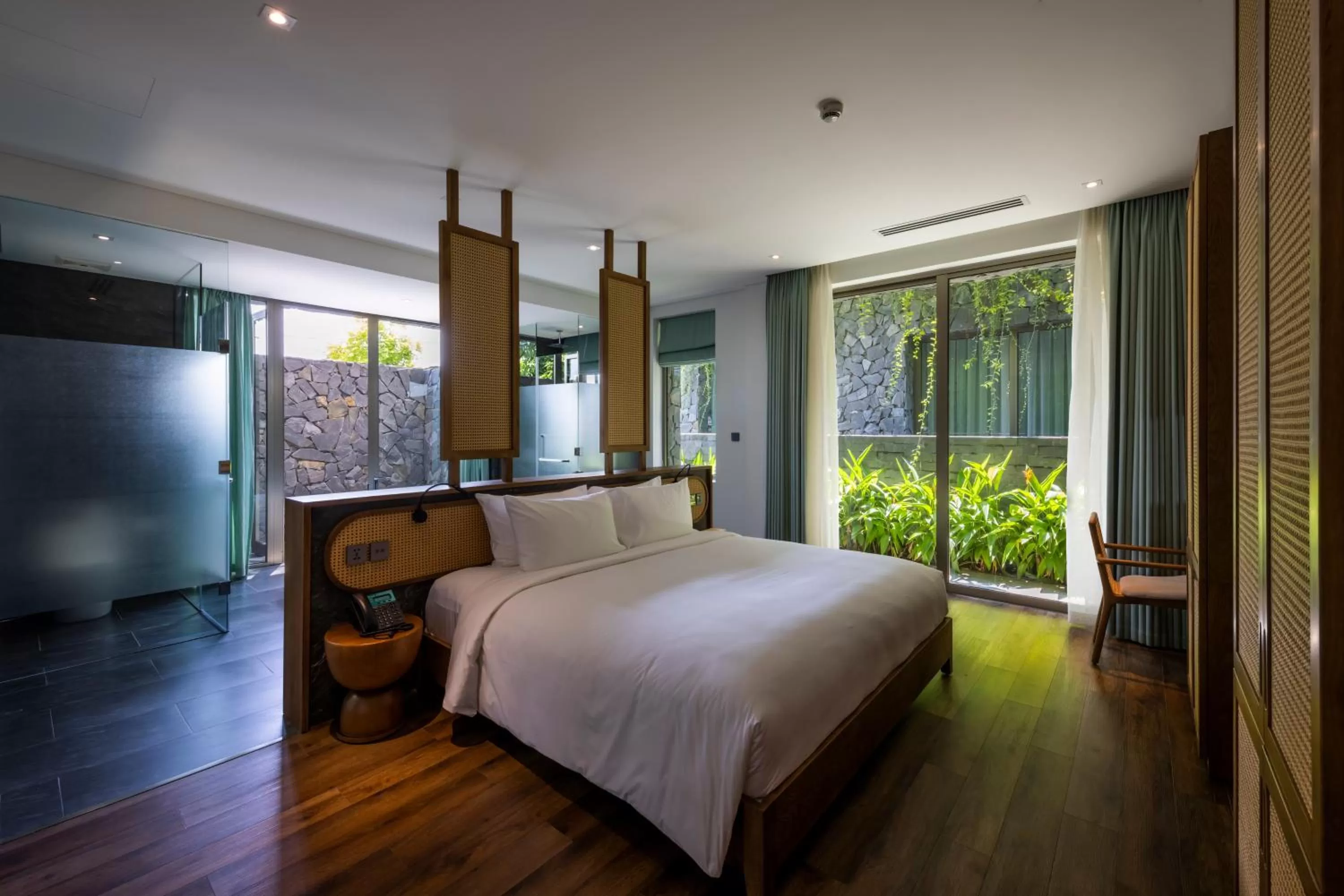 Bed in Bellerive Hoi An Resort and Spa