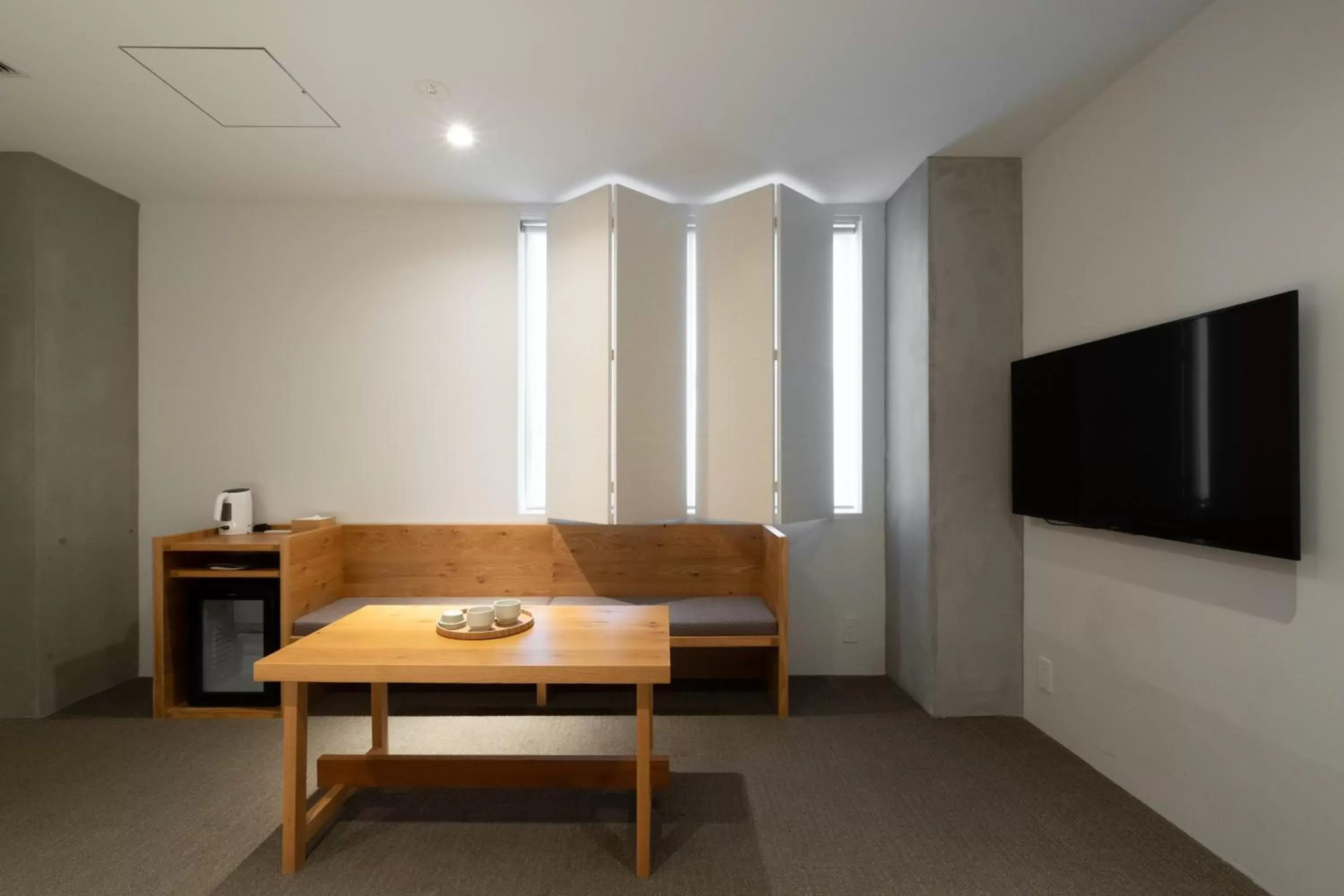 Photo of the whole room, Seating Area in TSUGU Kyoto Sanjo by THE SHARE HOTELS