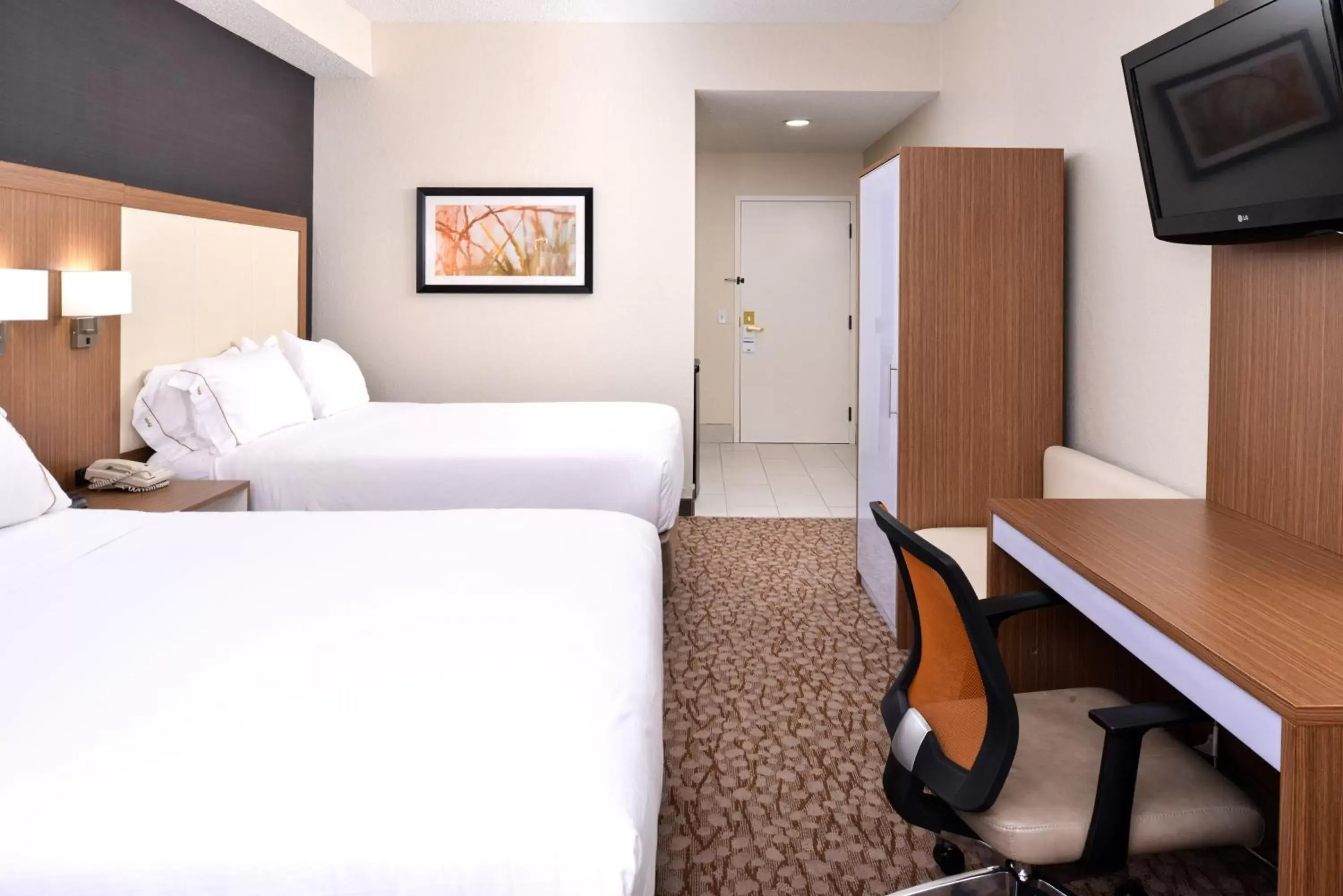 Bedroom, Seating Area in Holiday Inn Express Hotel & Suites Bonita Springs/Naples, an IHG Hotel