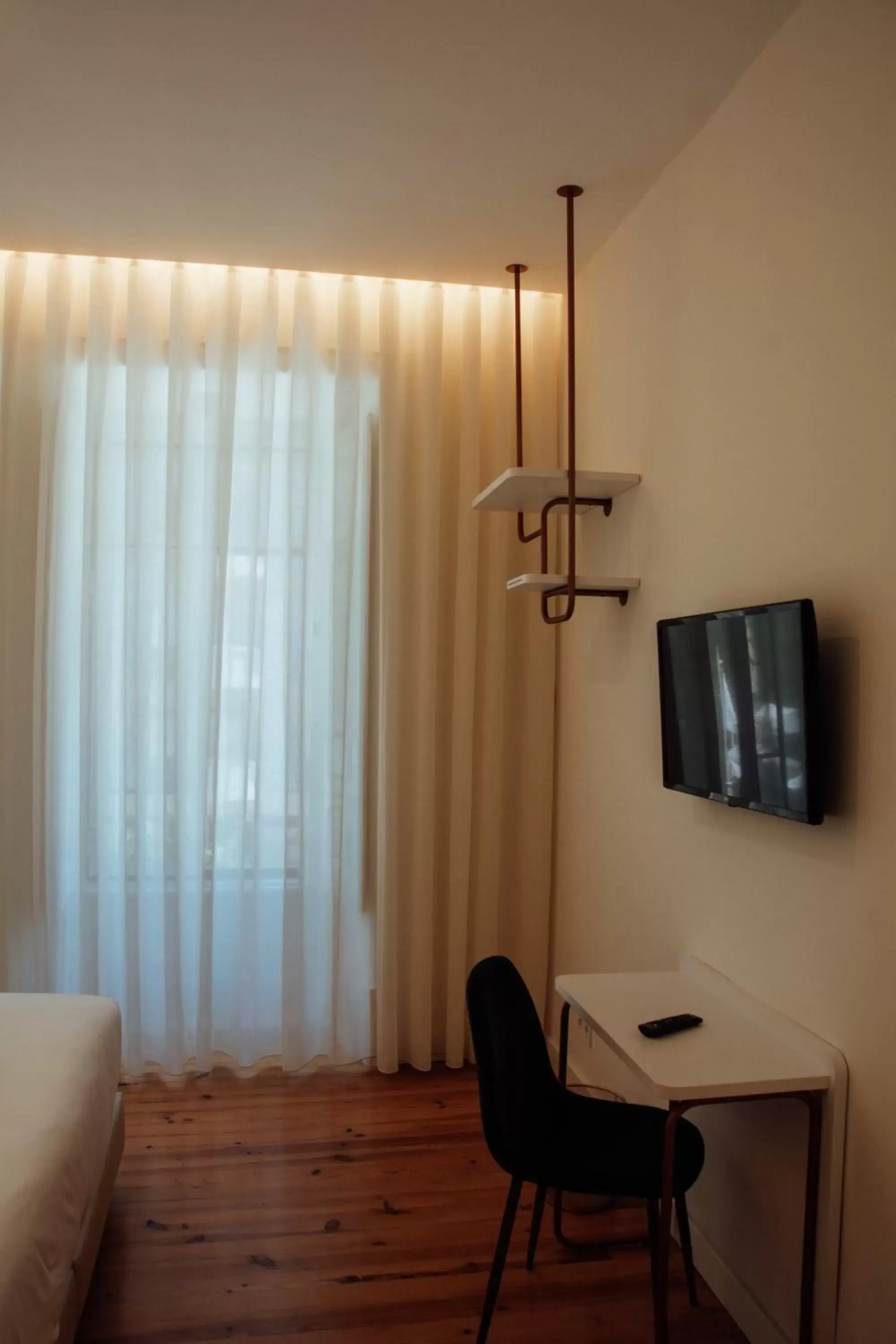 Bedroom, TV/Entertainment Center in Le Premier Lisbon Suites