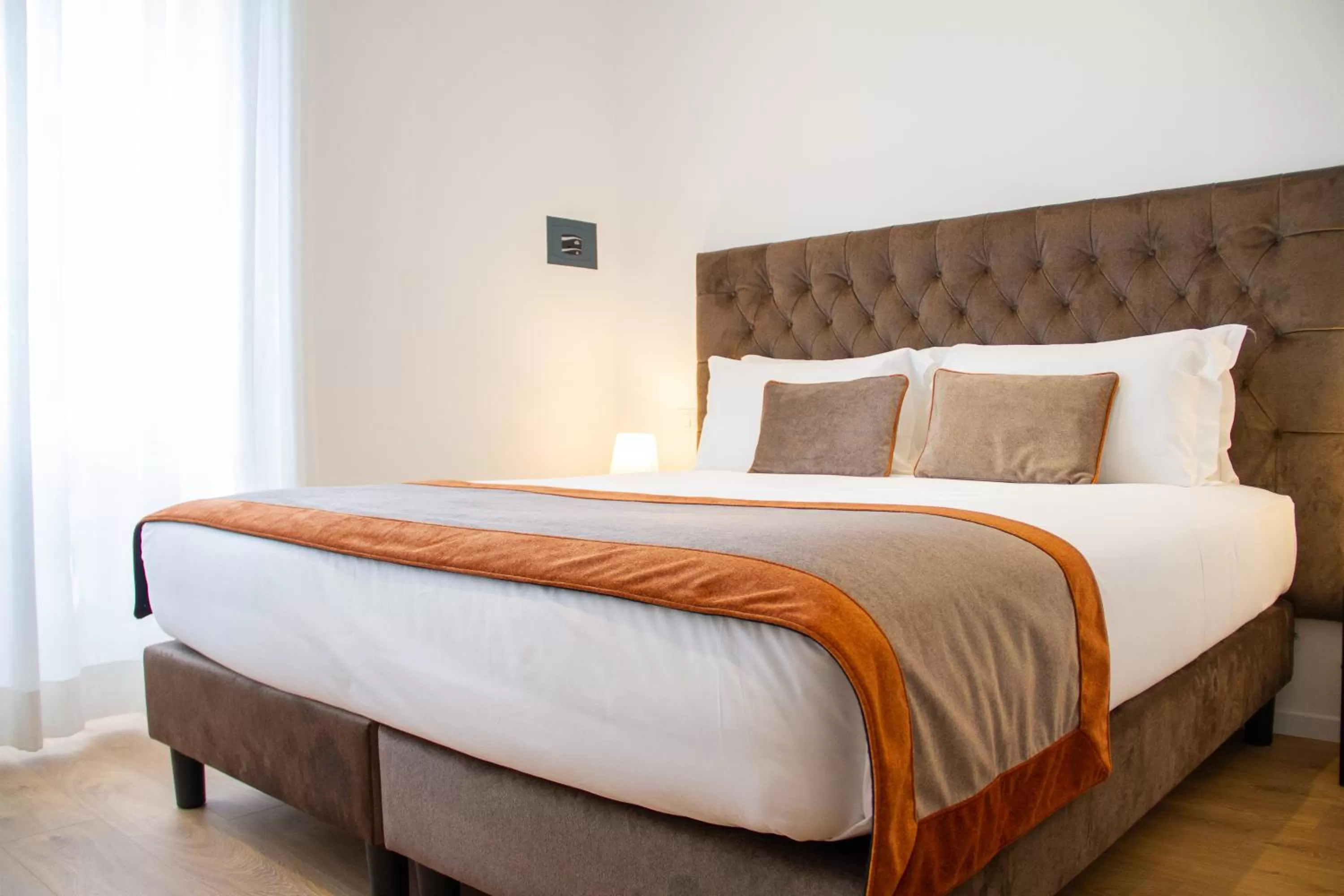 Bed in Michelangelo Vatican Rooms