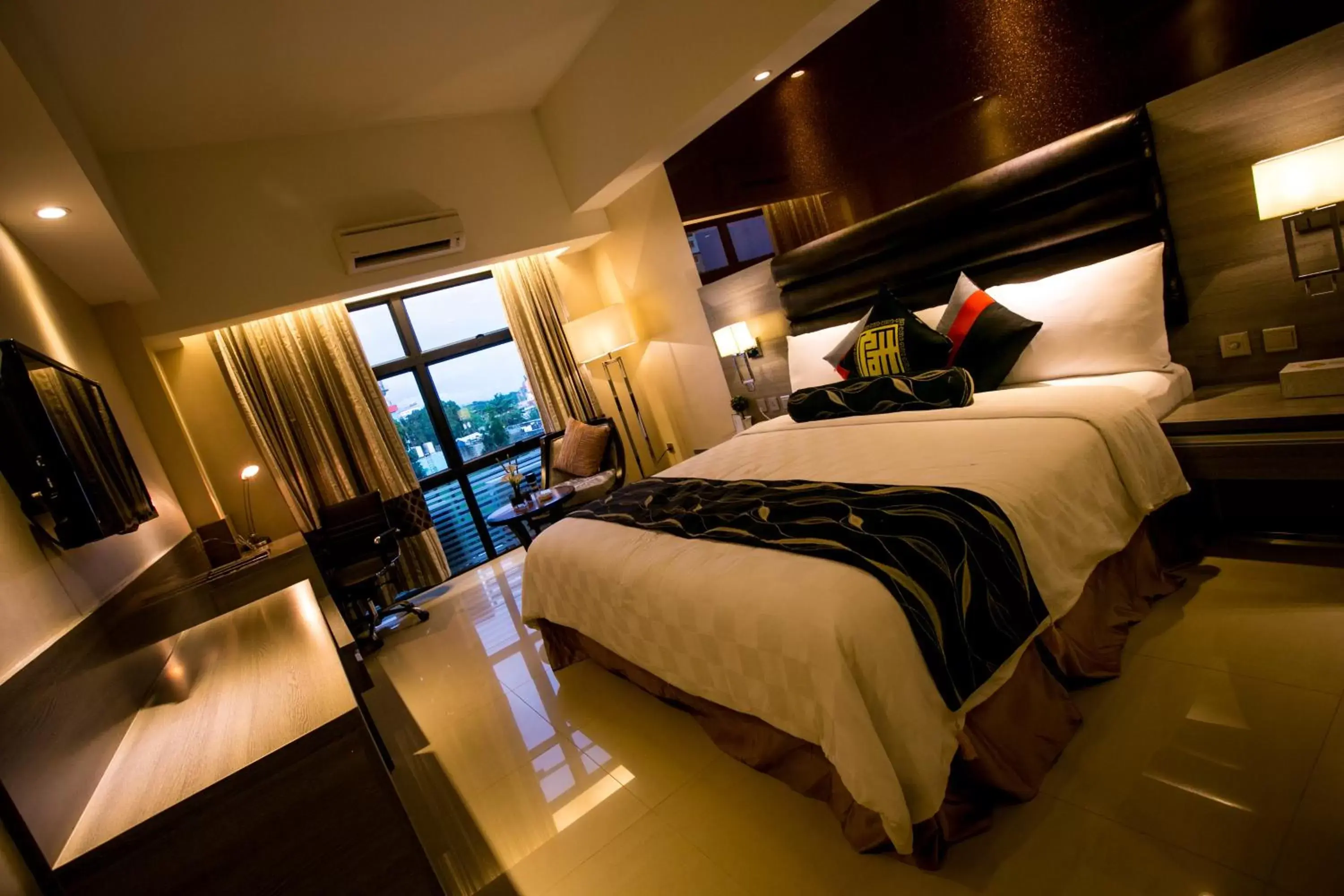 Bedroom in Prime Asia Hotel