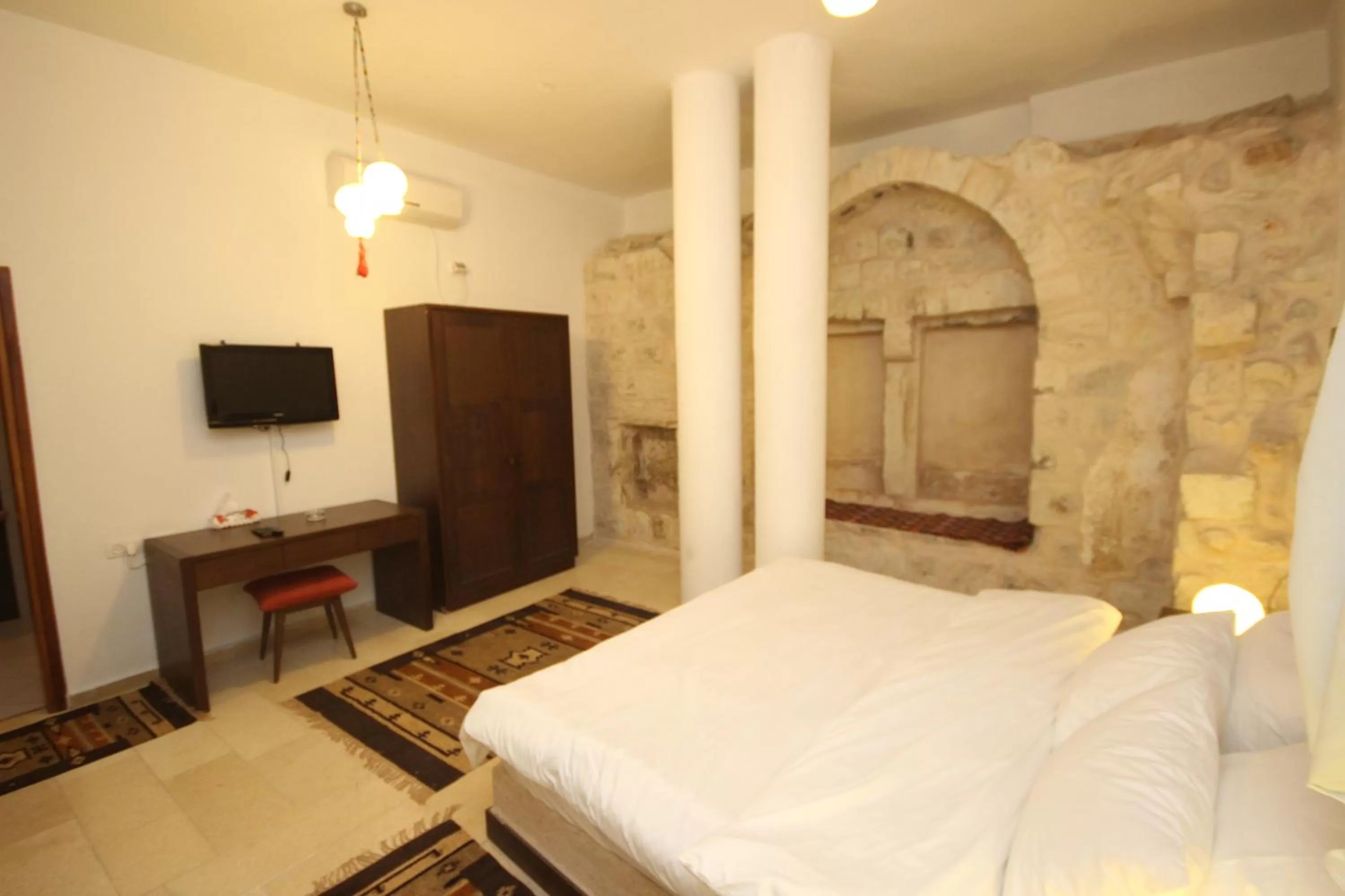 Bed in Khan Alwakala Hotel