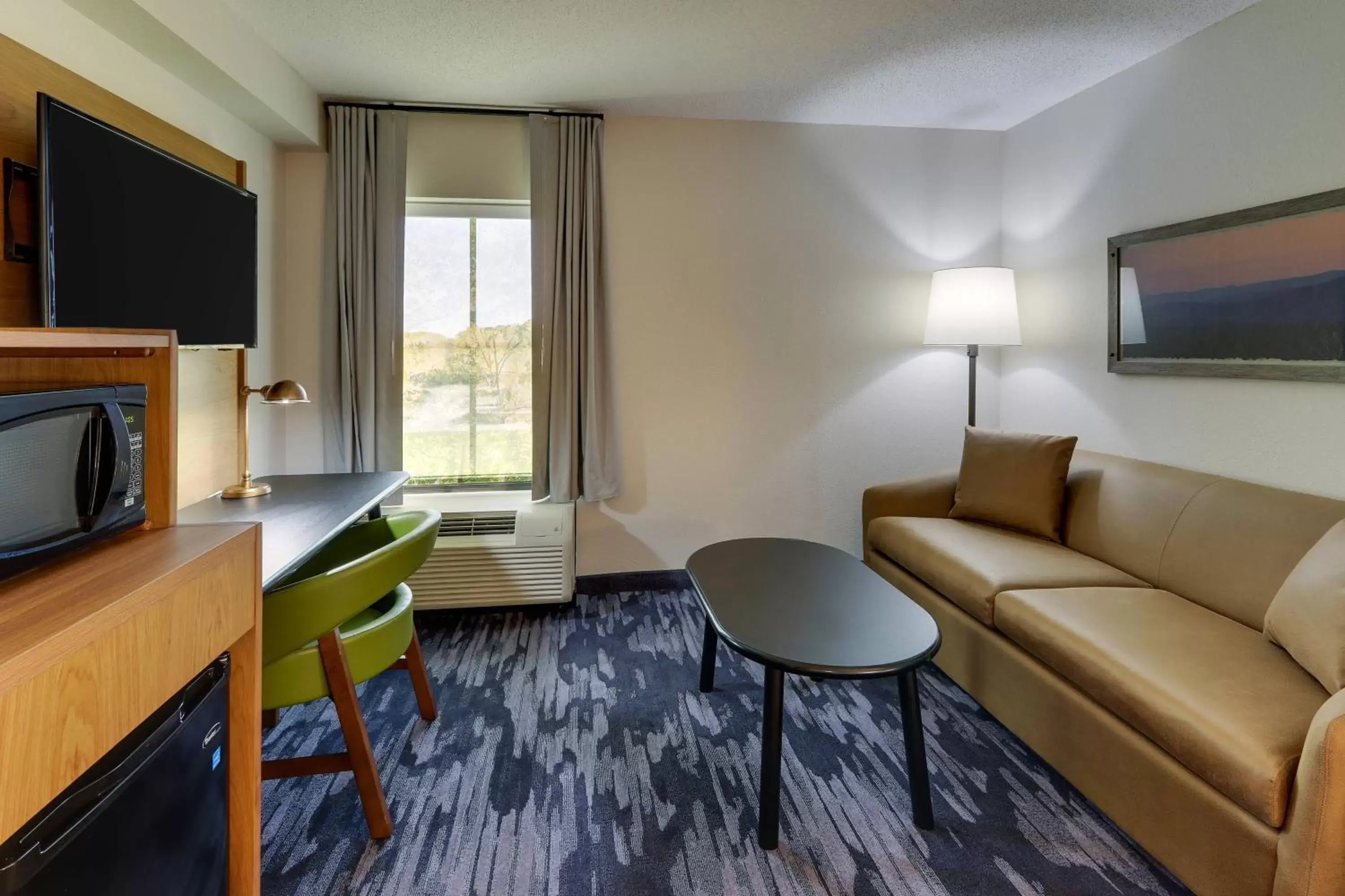 Photo of the whole room, Seating Area in Fairfield Inn & Suites Southport