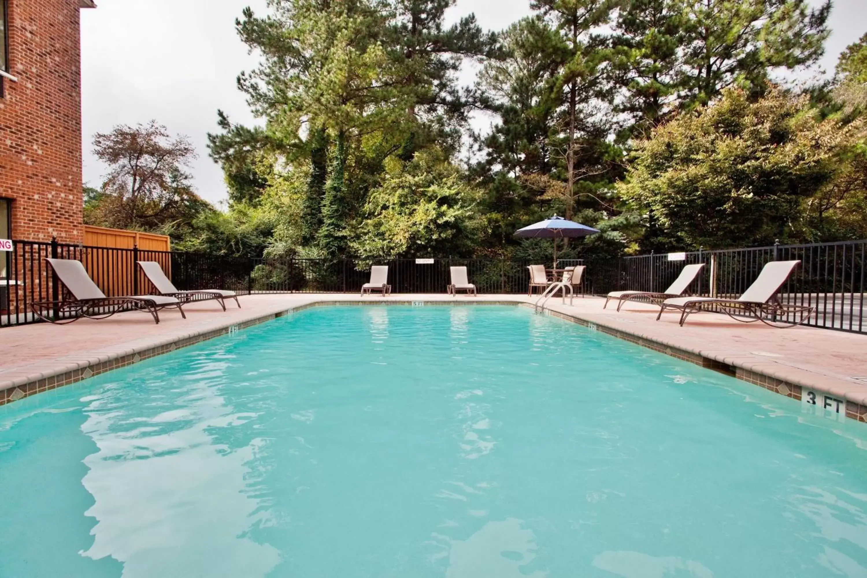 Swimming Pool in Holiday Inn Express & Suites Buford NE - Lake Lanier Area, an IHG Hotel