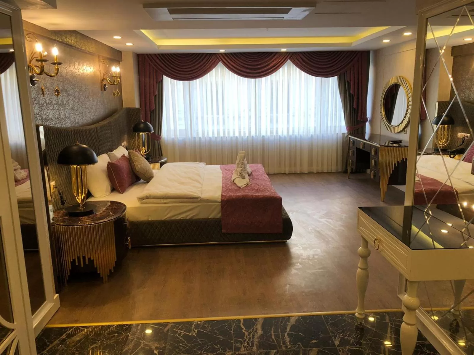 Photo of the whole room, Bed in Burj Al Istanbul
